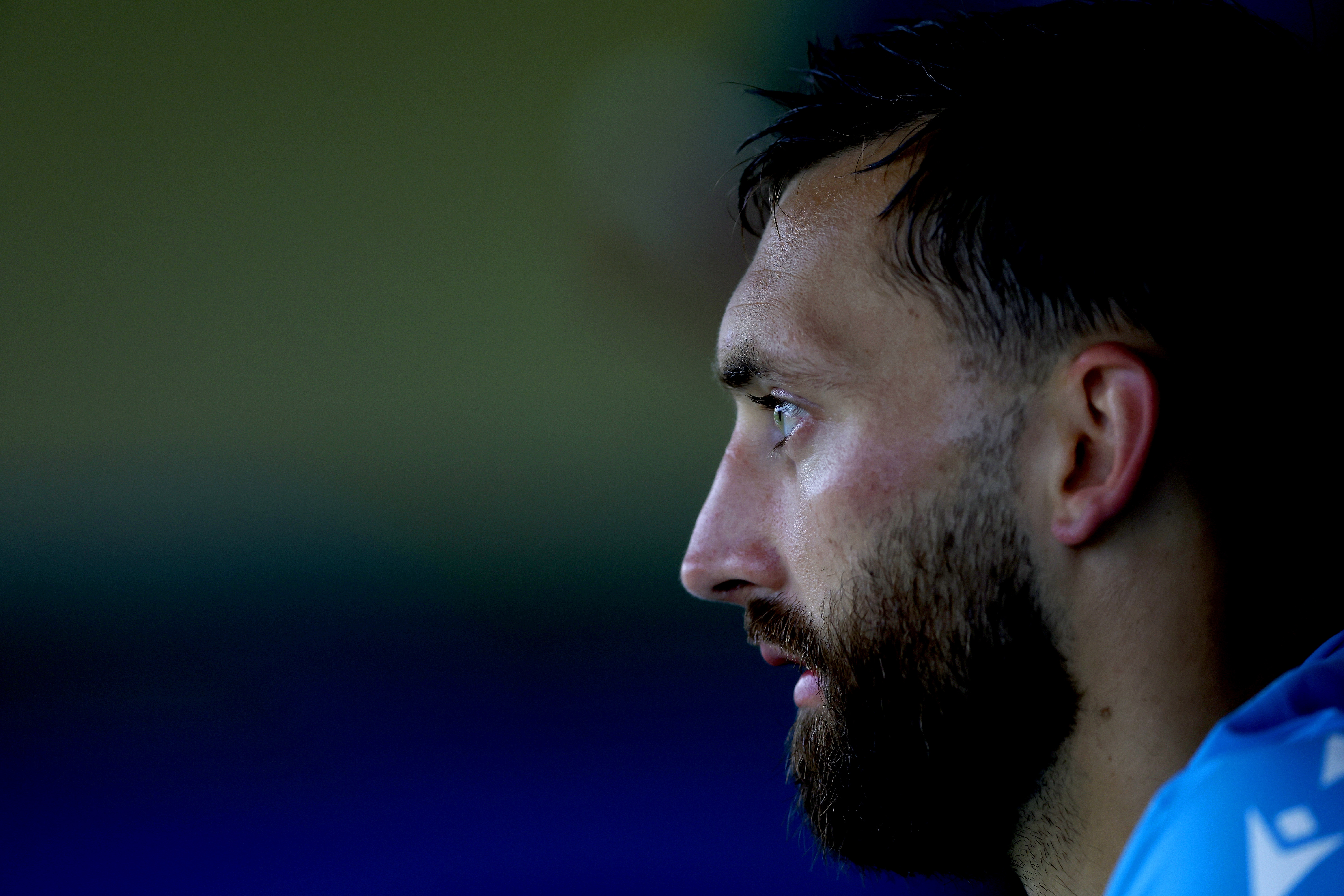 A close up of the side of Nat Phillips' face 