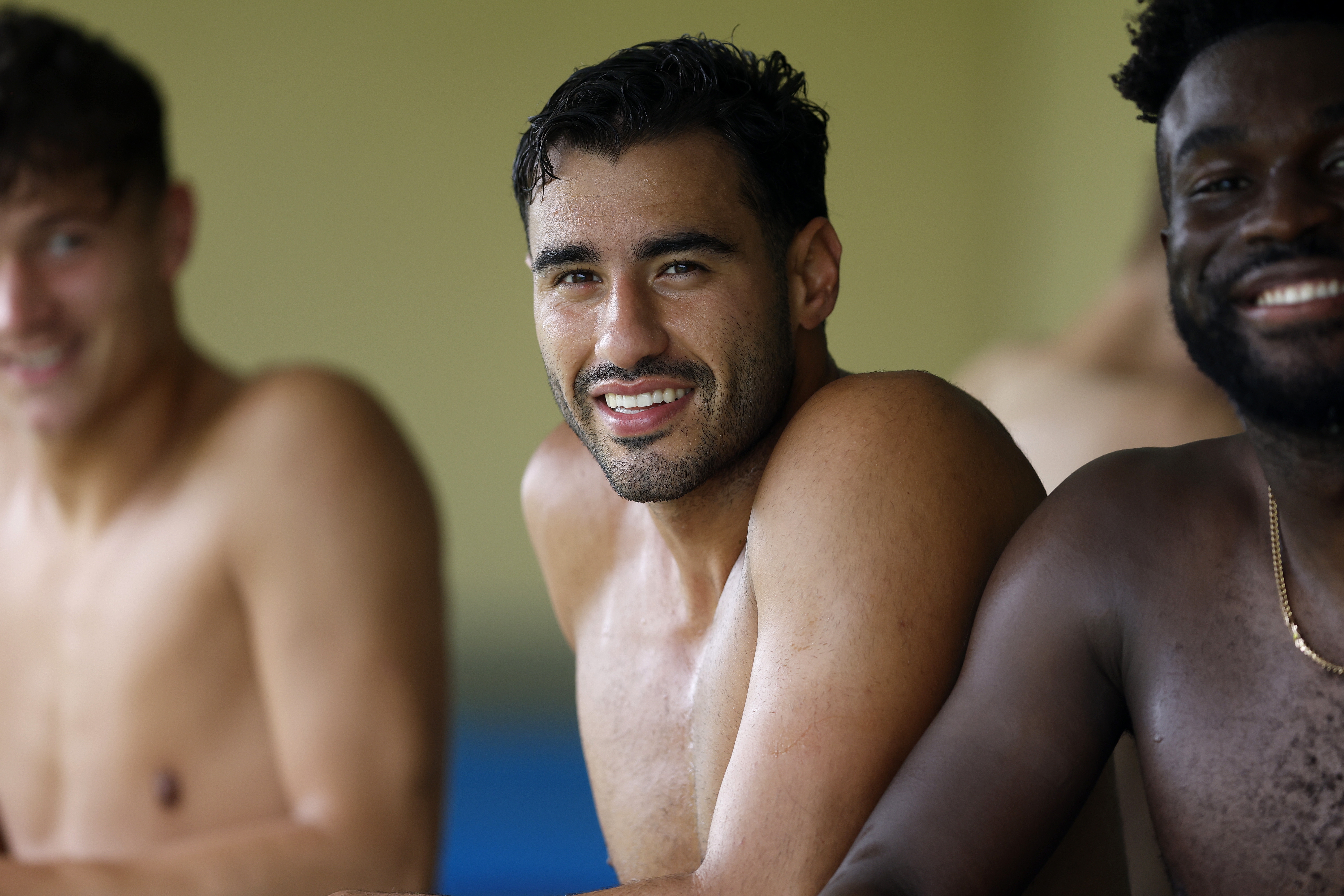 Gianluca Frabotta smiling while sat in an ice bath