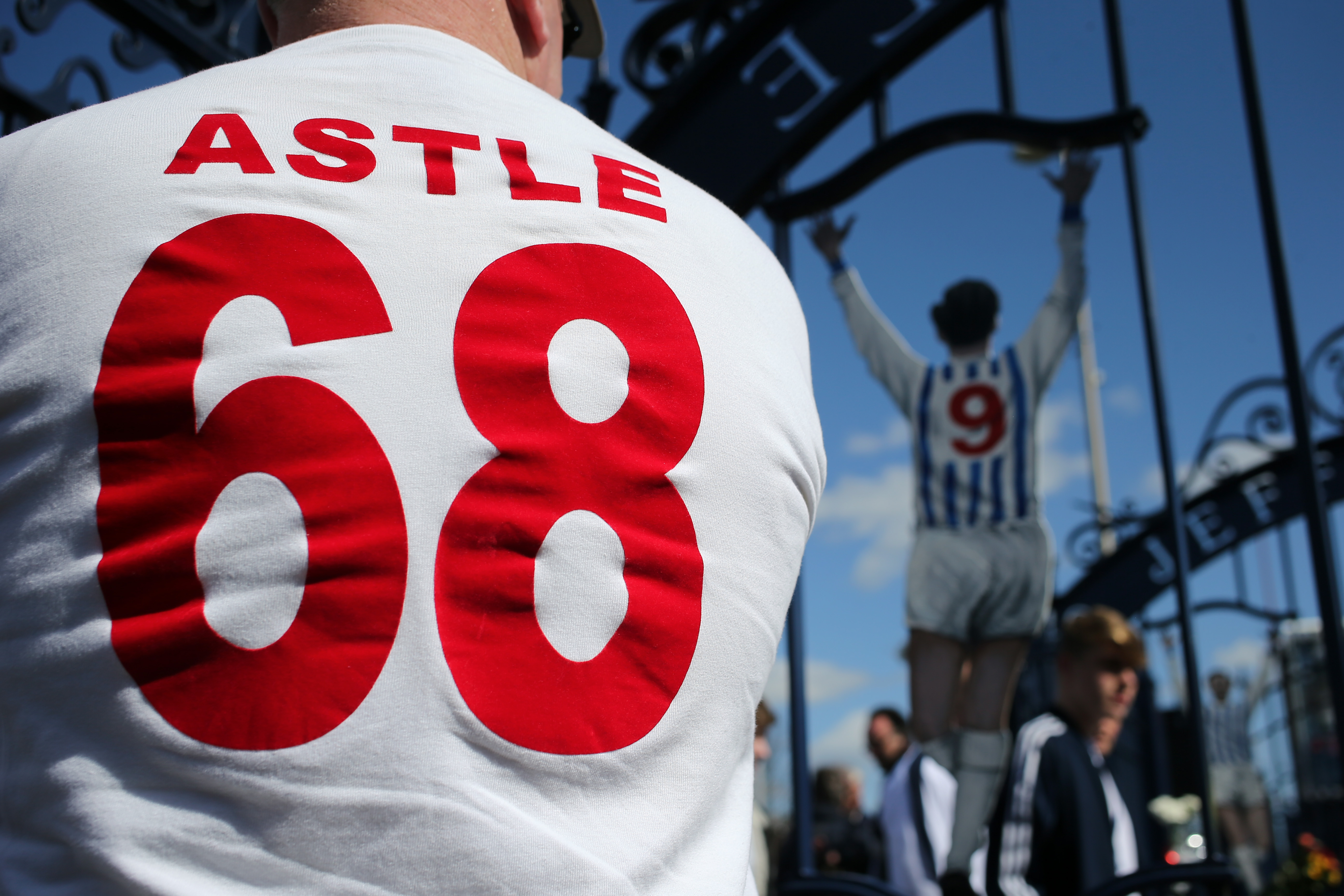 Astle 68 Shirt in front of Astle Gates