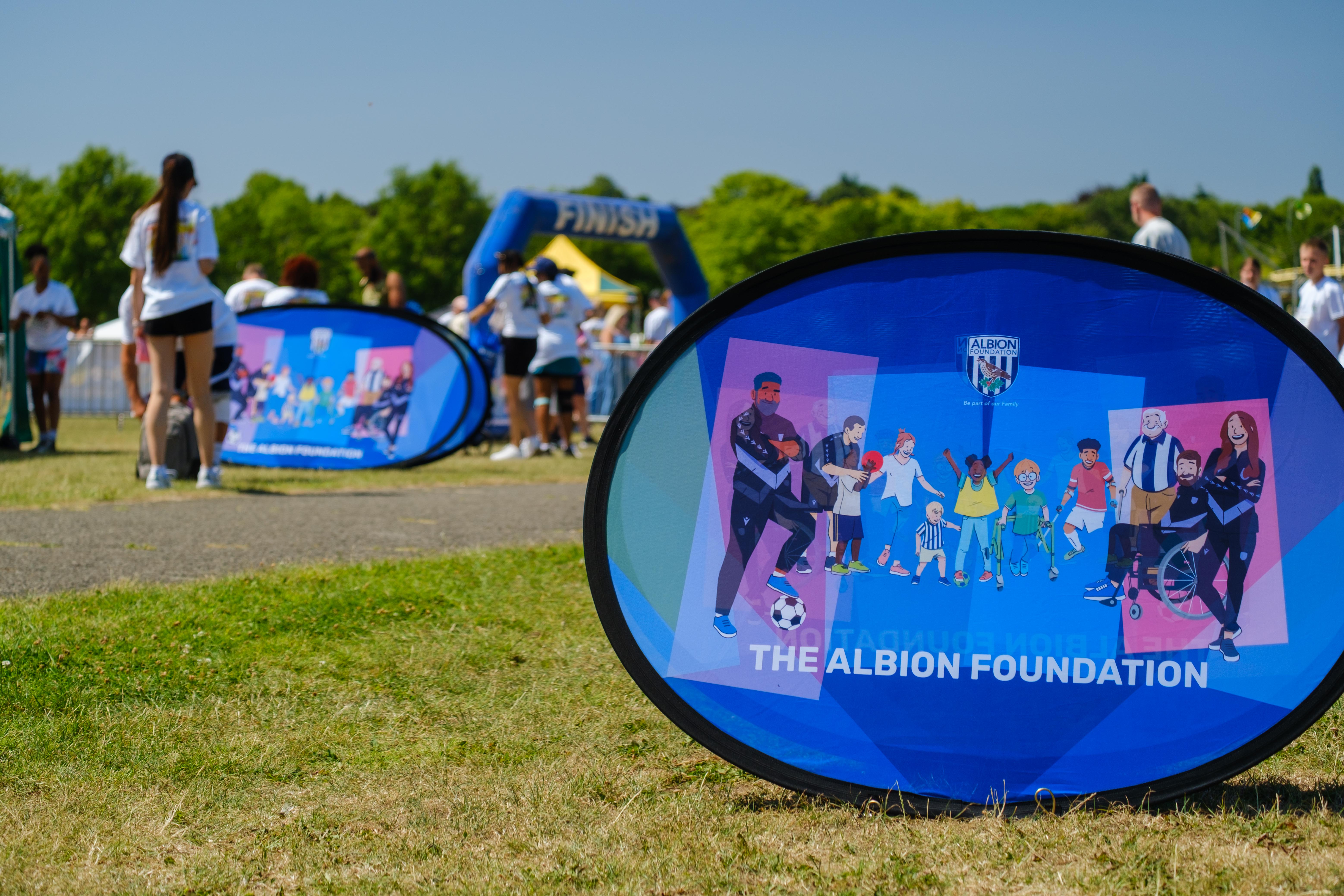 Close up of Foundation Branding on the grass.