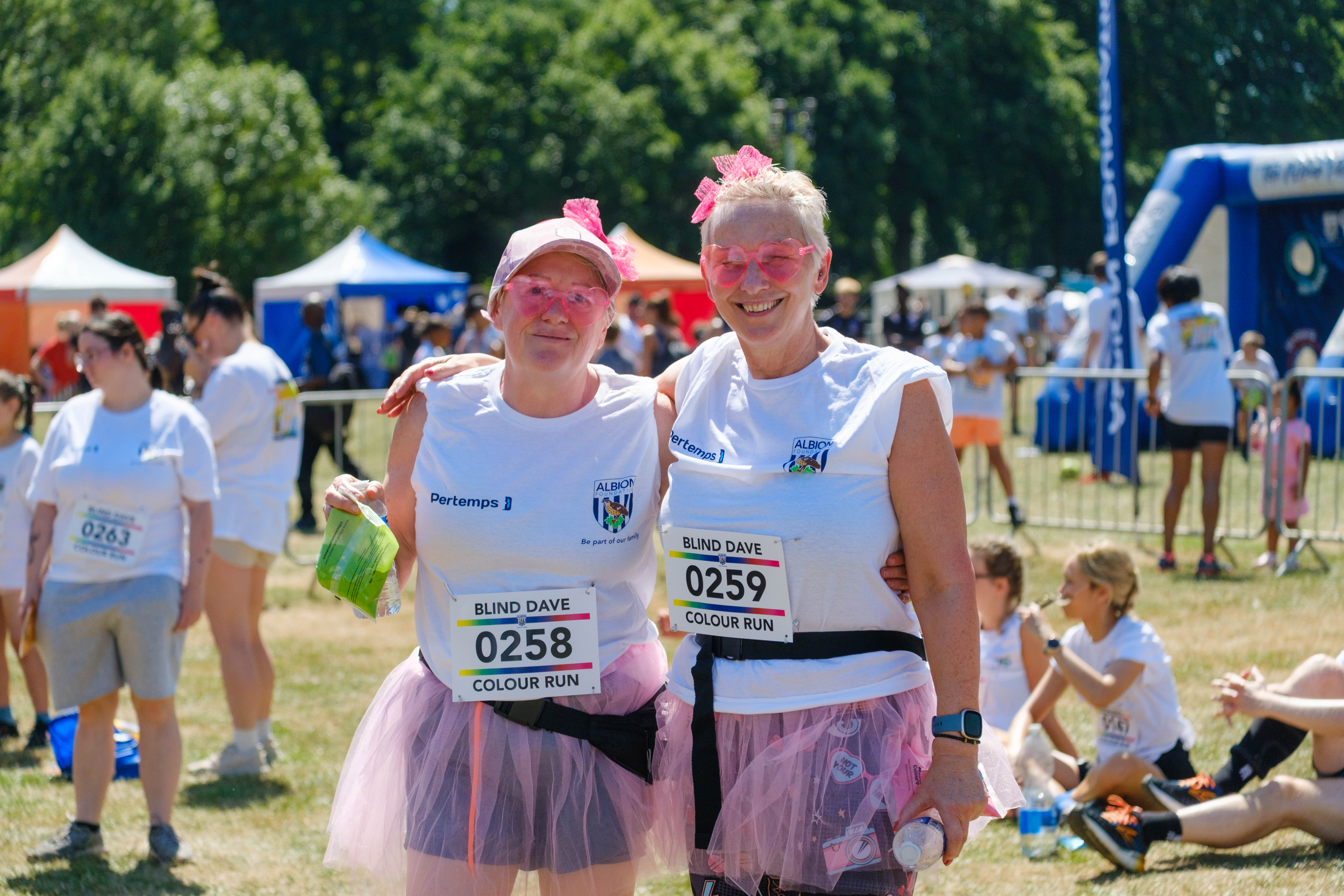 Two participants in pink girls and tutu