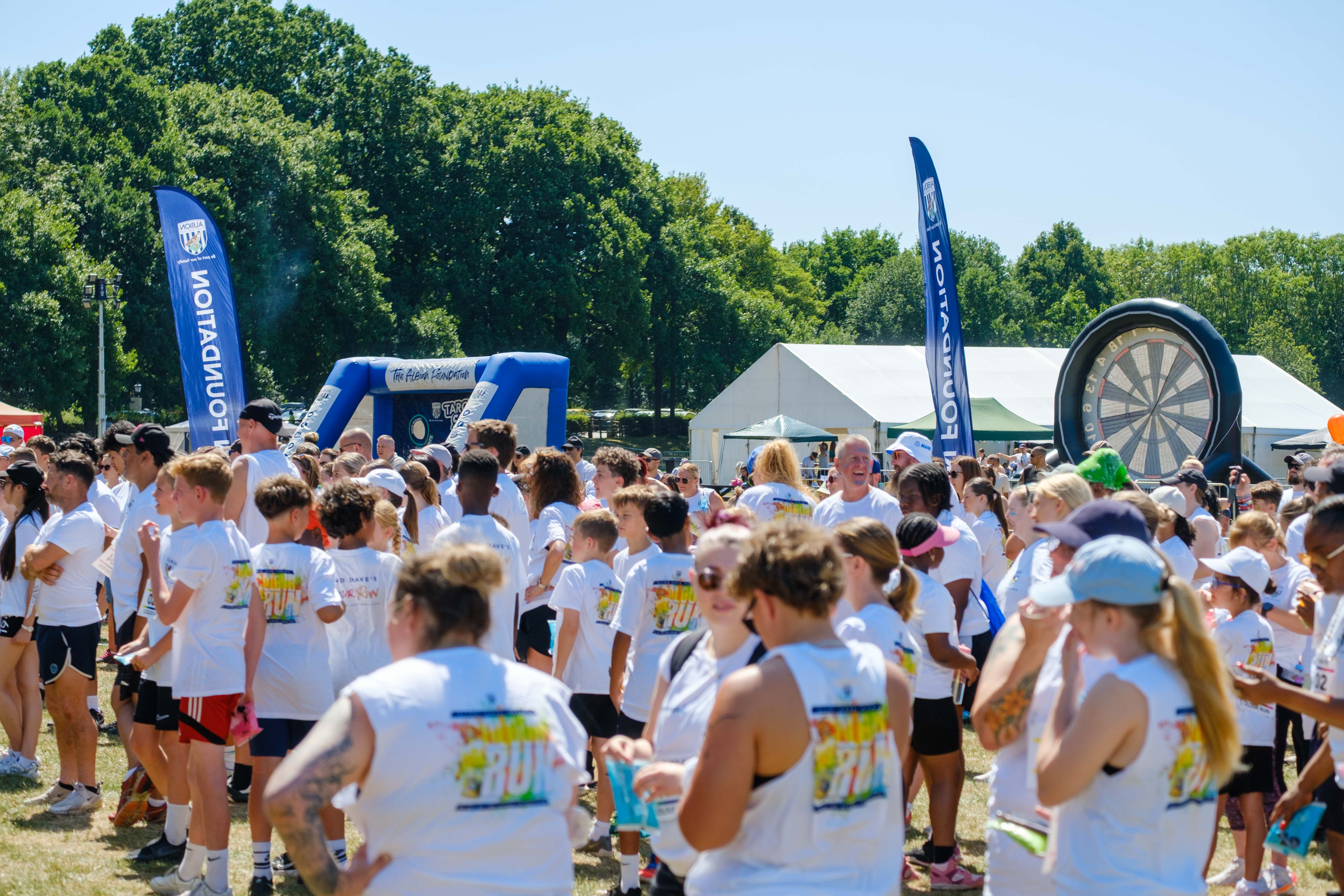 Wide view of participants warming up.