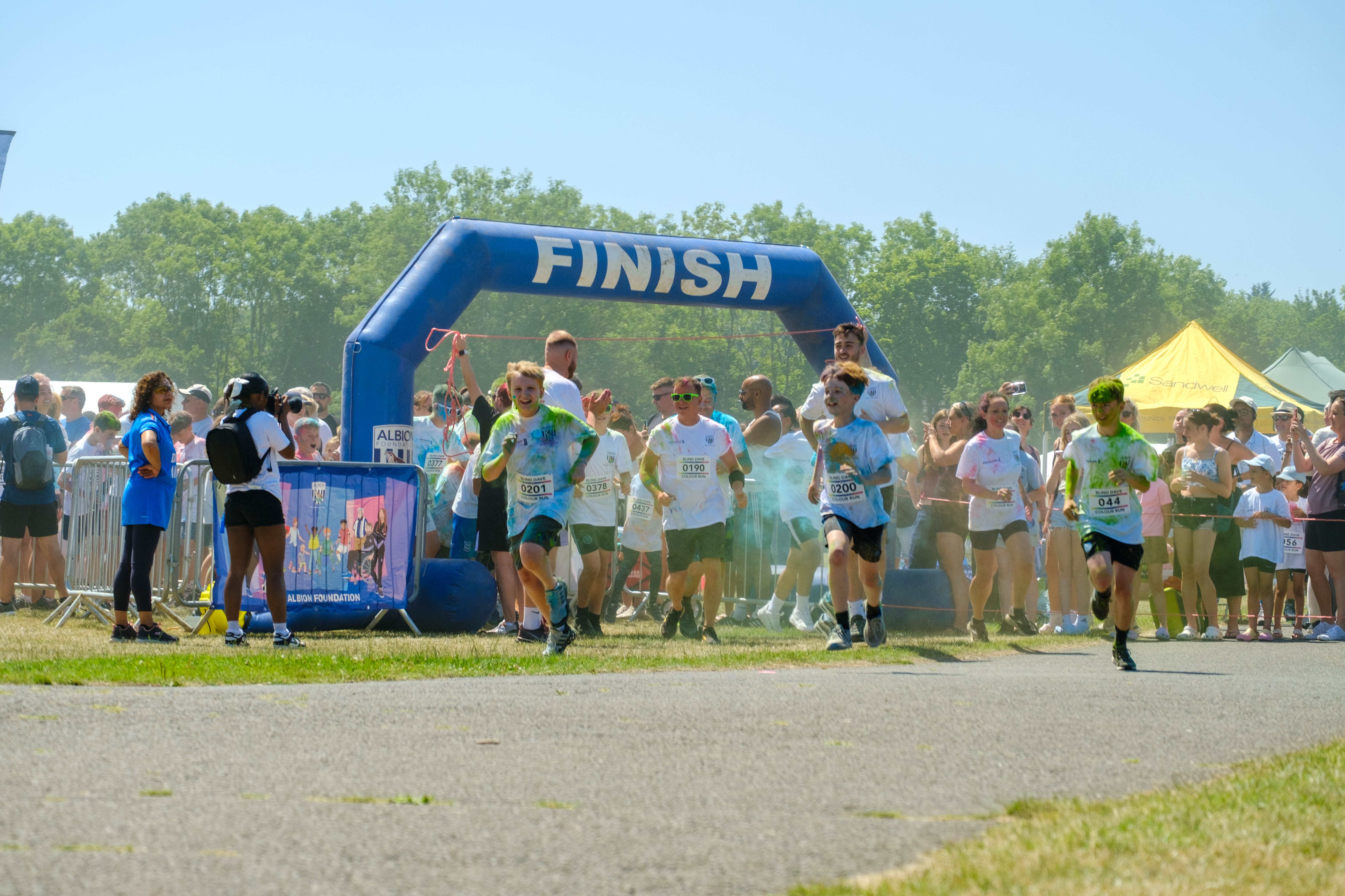 First wave of runners leaving the start line.
