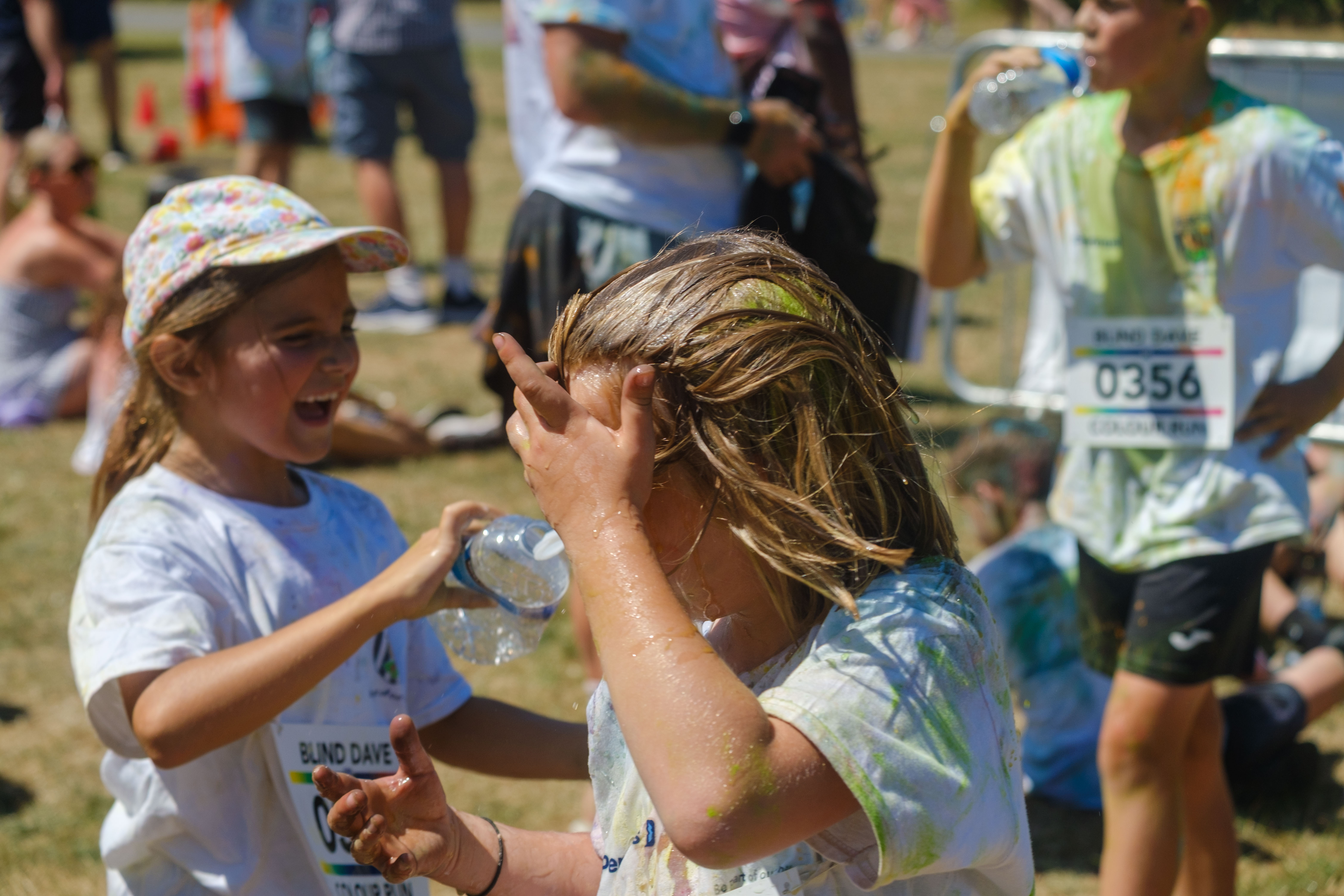 Closing up of young participant, after running water over hair.