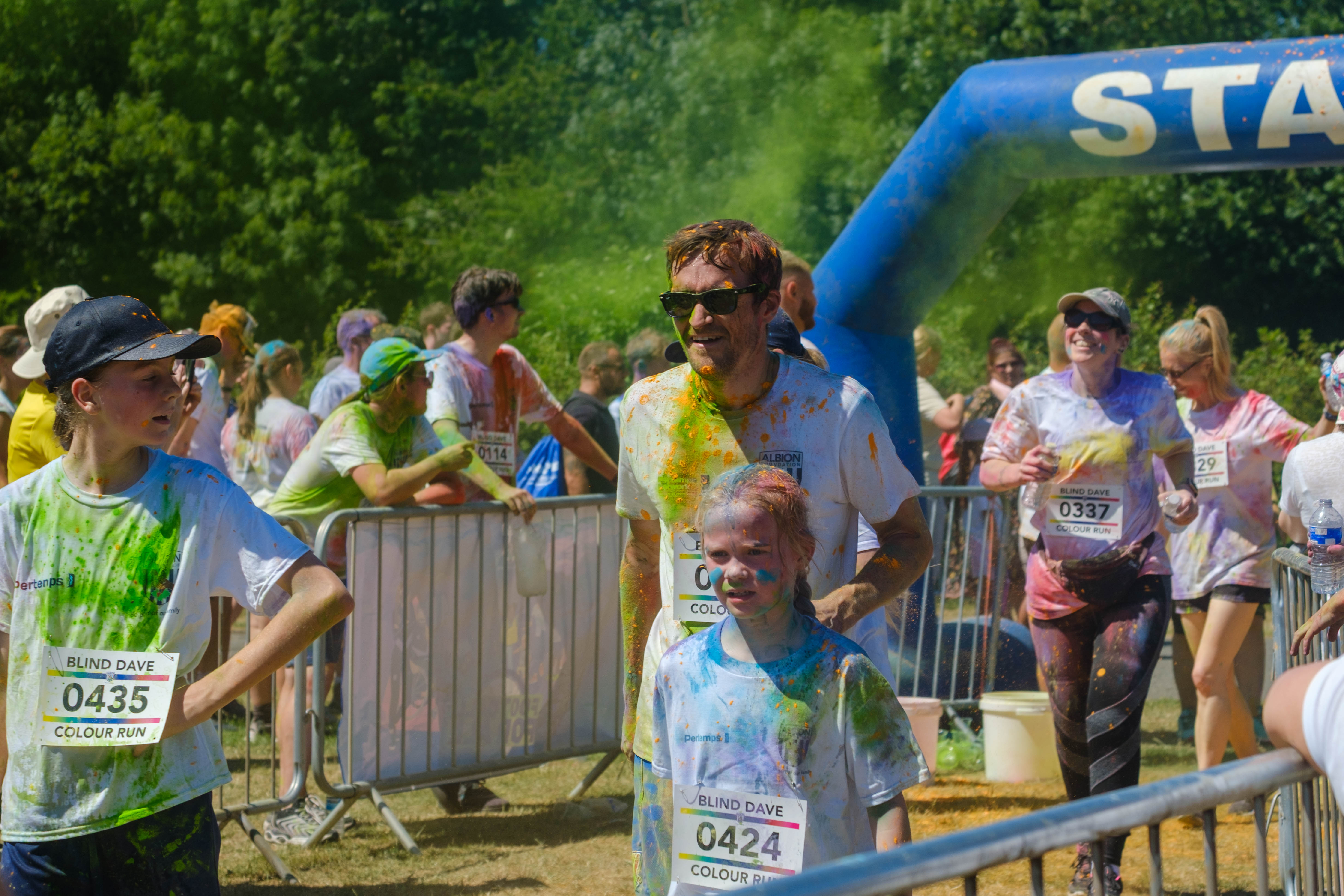 Runners running through the finish area