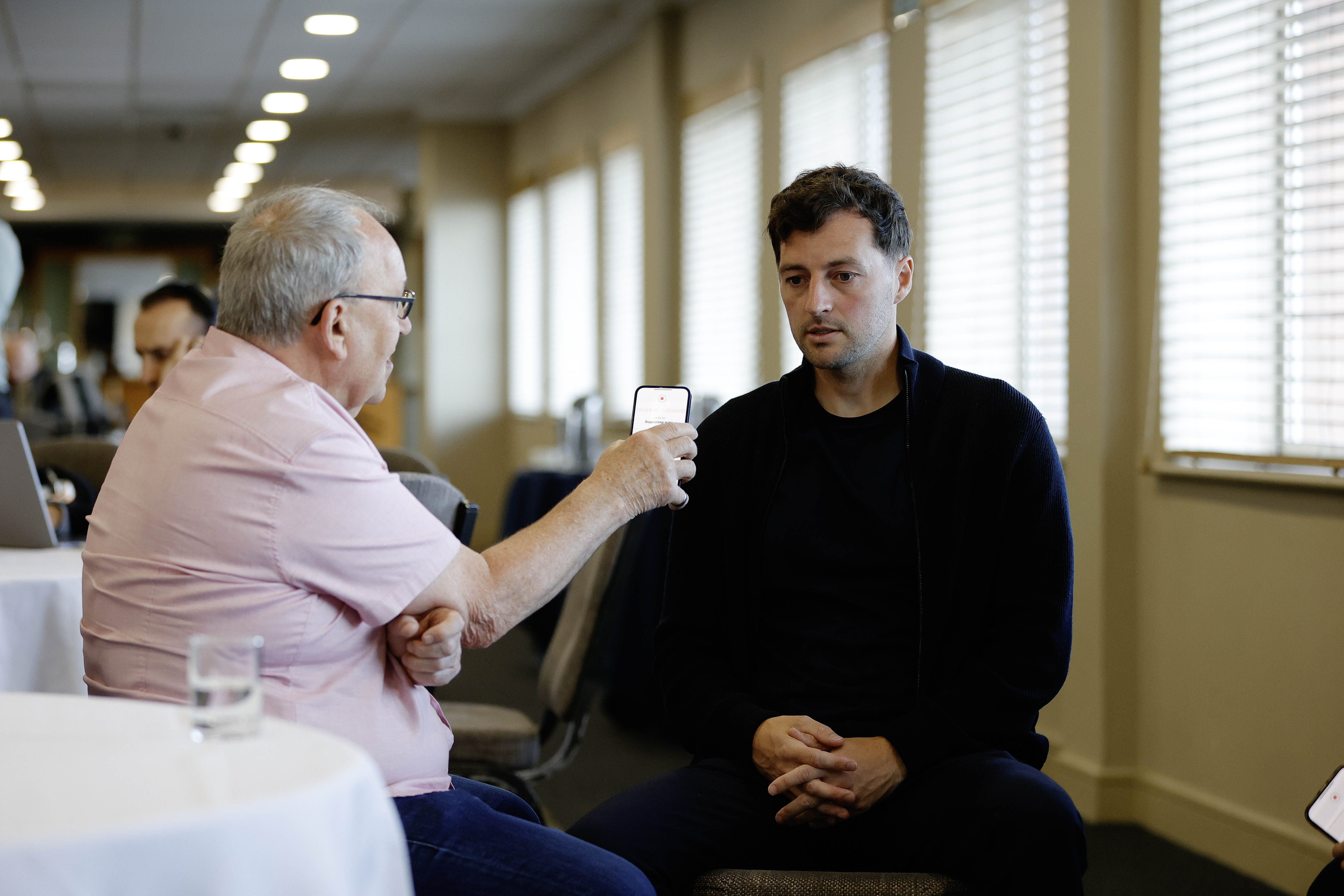 Ryan Mason talking to a radio reporter 