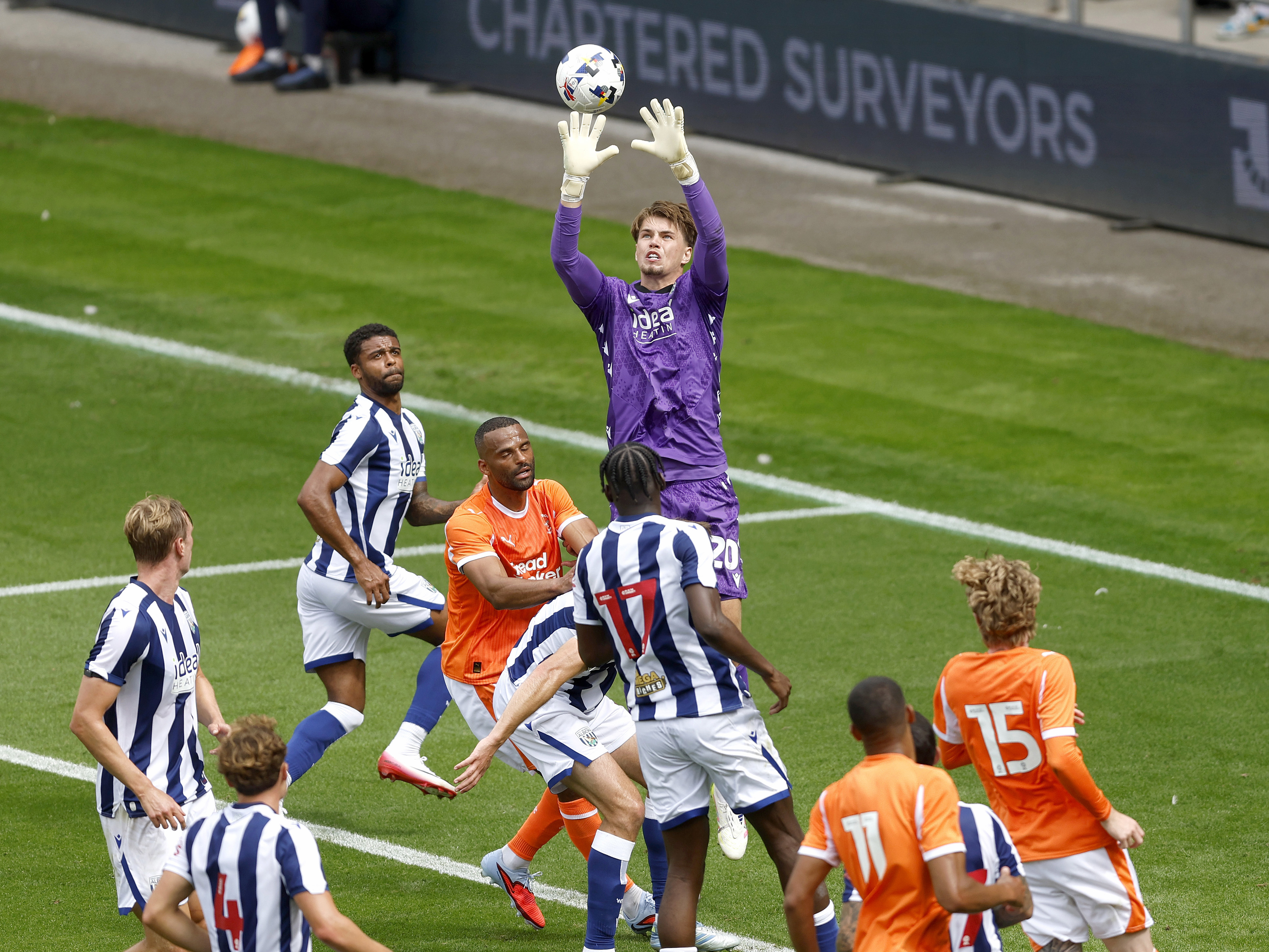 An image of Josh Griffiths claiming the ball against Blackpool