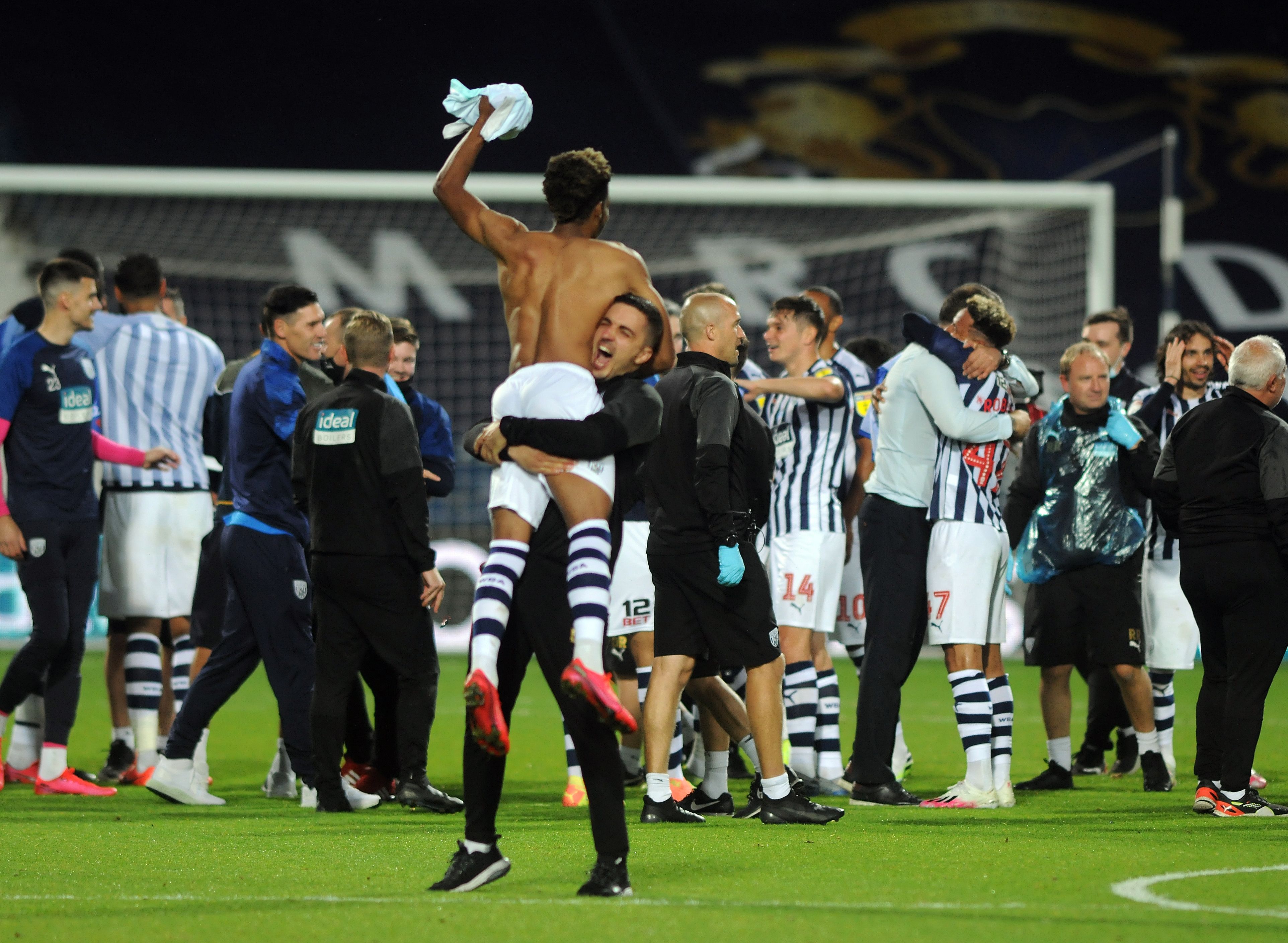 Men's Team Squad Celebrating at The Hawthorns after returning to the Premier League