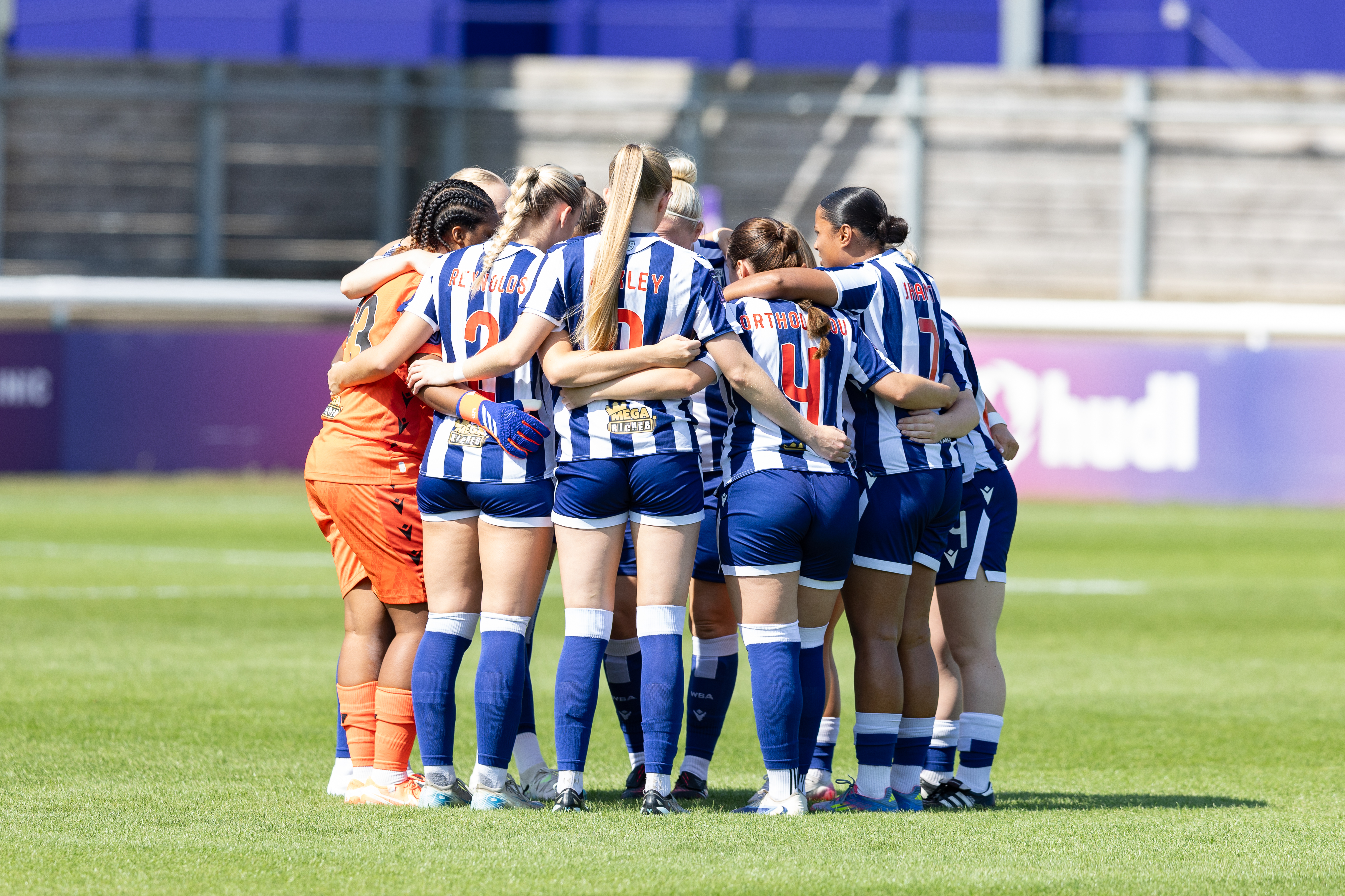 Albion Women team in a huddle before the game at Loughborough Lightning 