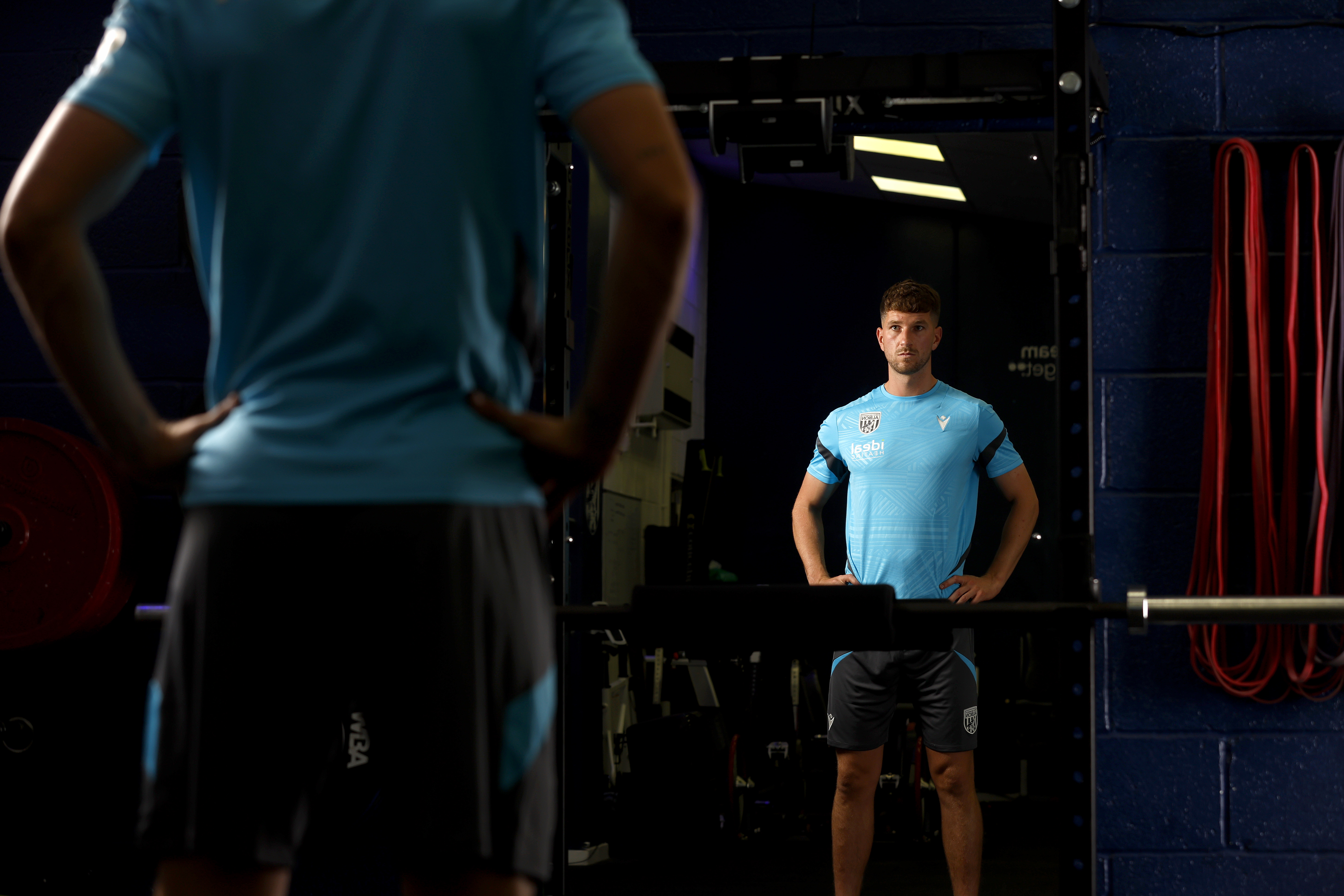 Chris Mepham looking in a mirror in the gym