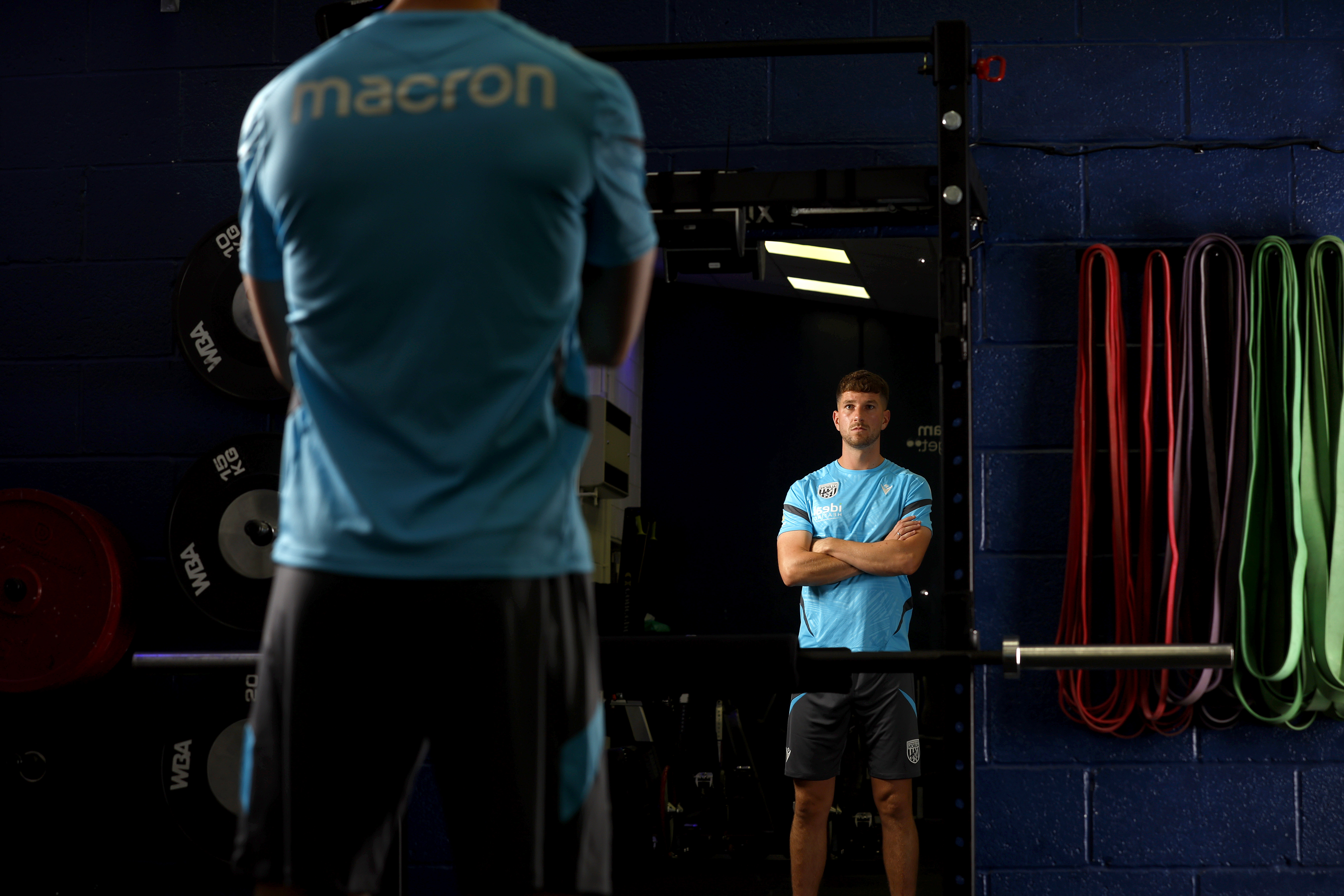 Chris Mepham looking in a mirror in the gym