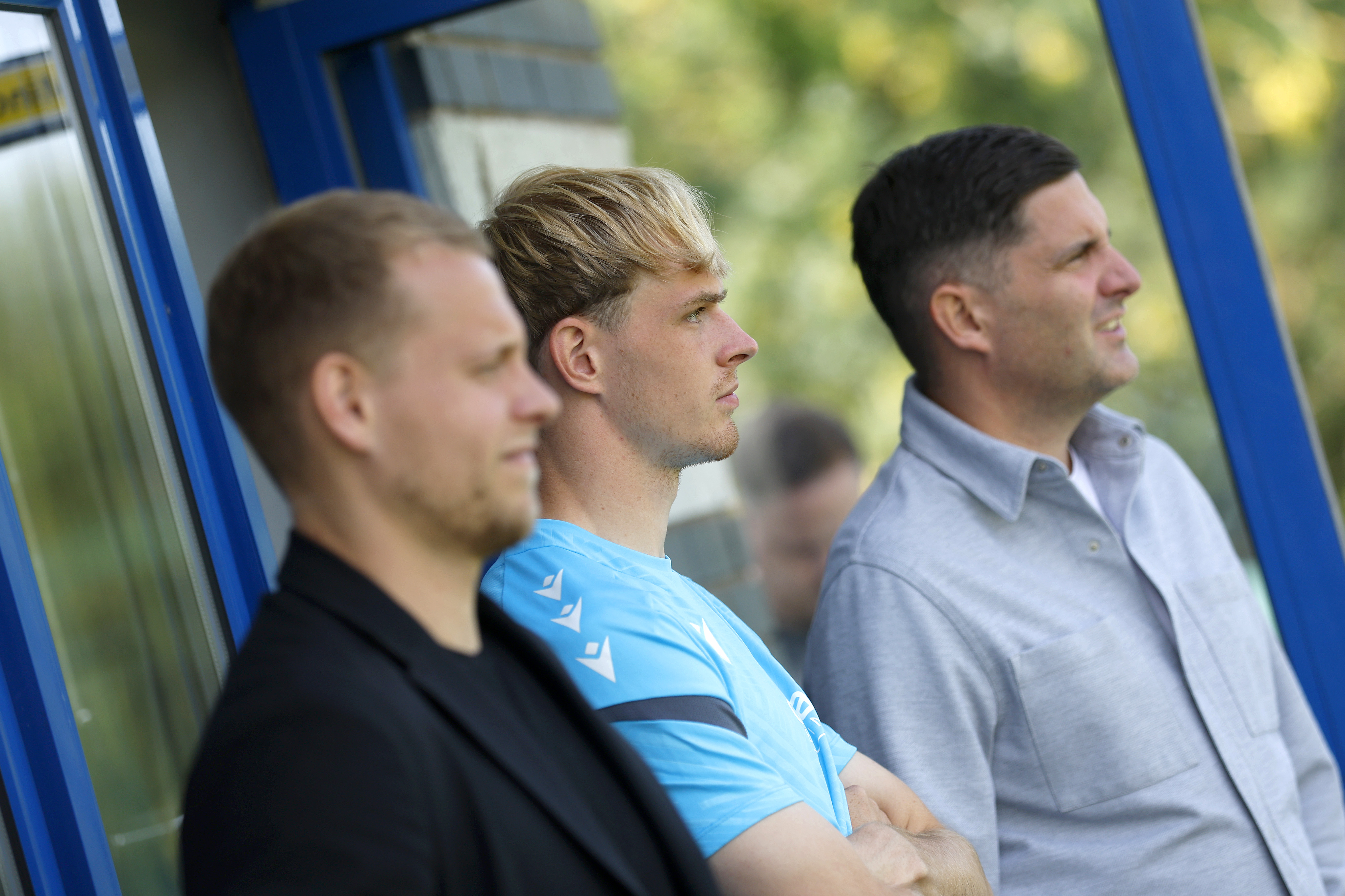 Toby Collyer watching training with his representatives 