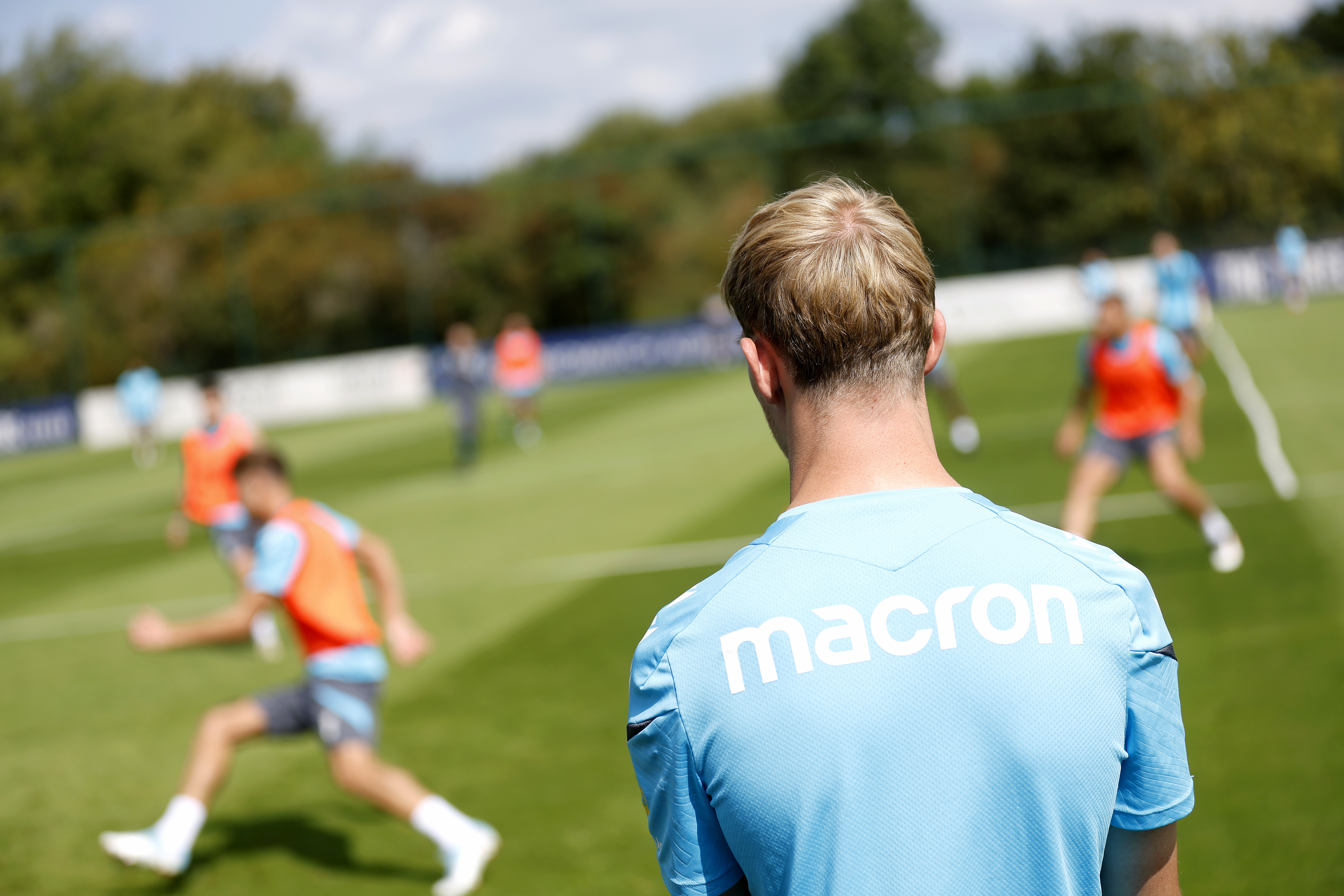Toby Collyer watching training 