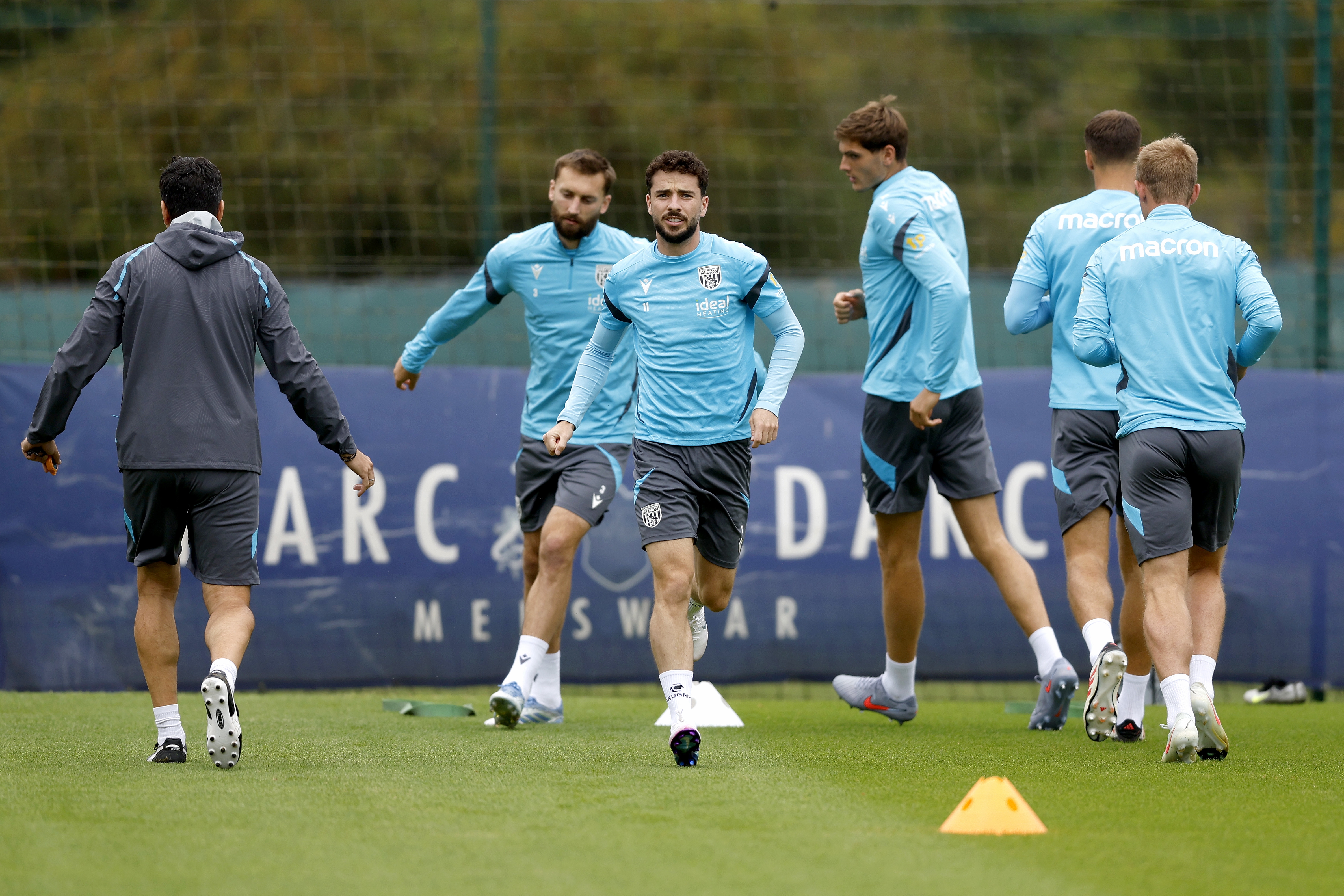 Several players warming up during a training session