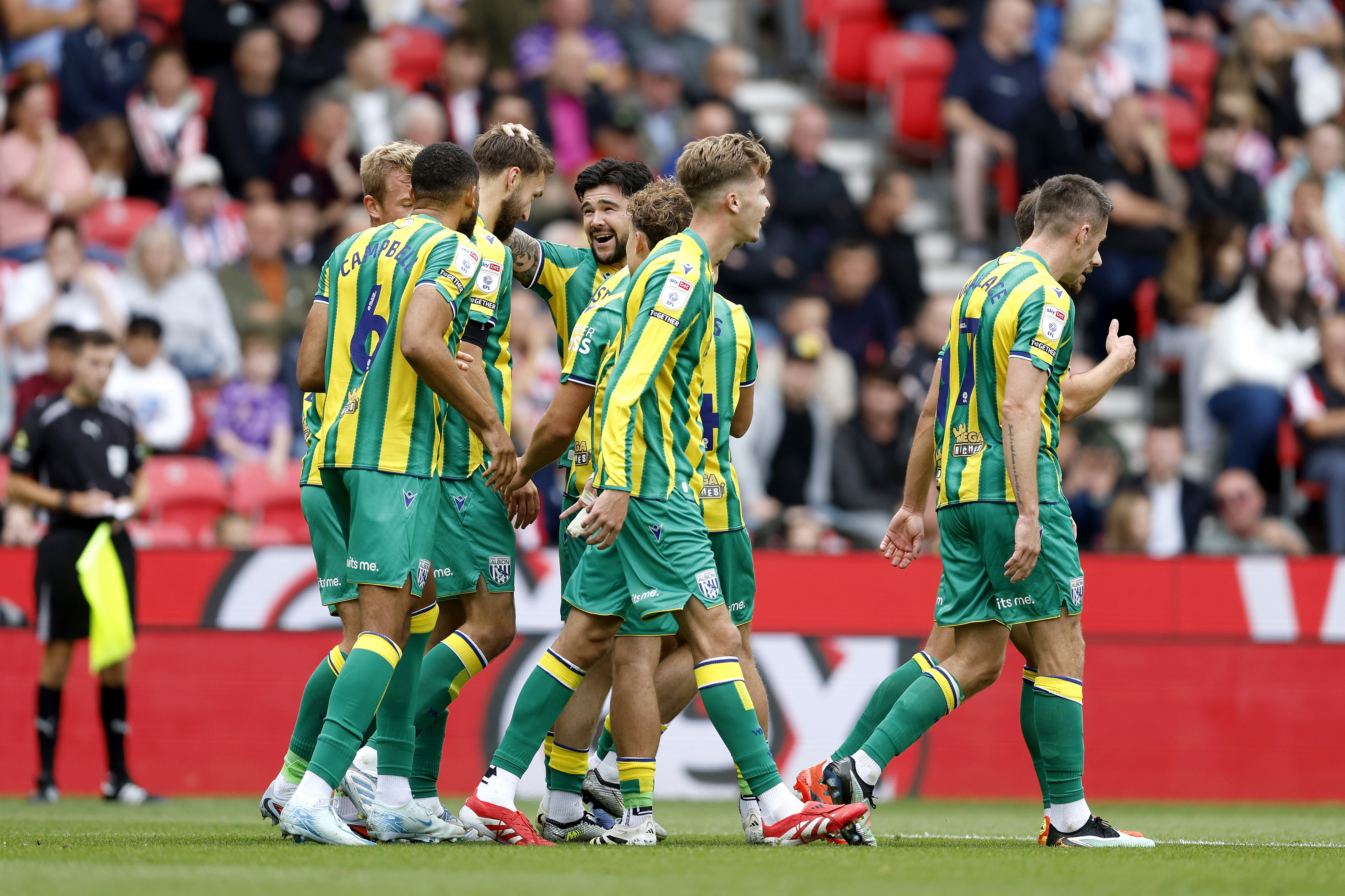 Nat Phillips celebrates scoring v Stoke with team-mates