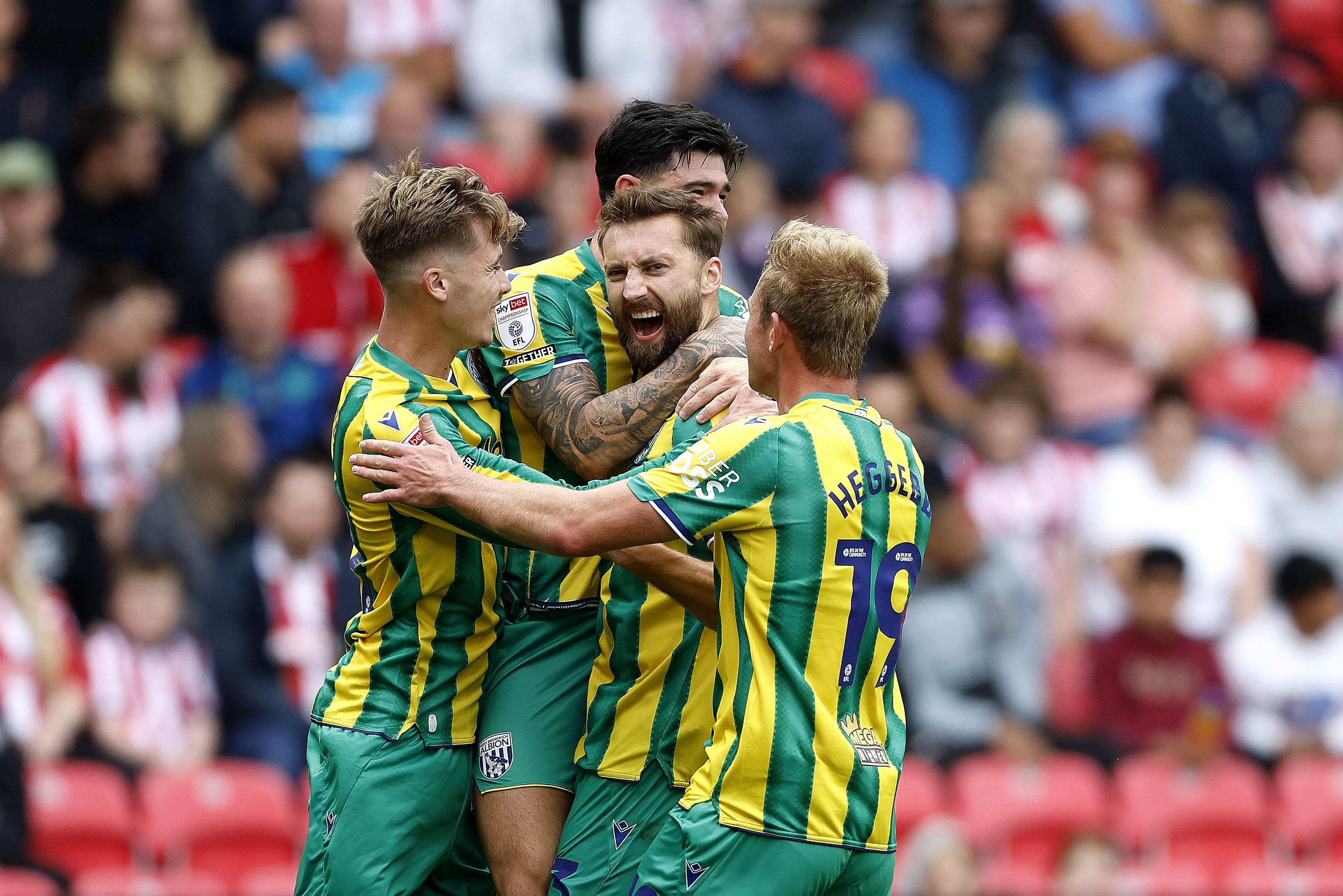 Nat Phillips celebrates scoring v Stoke with team-mates