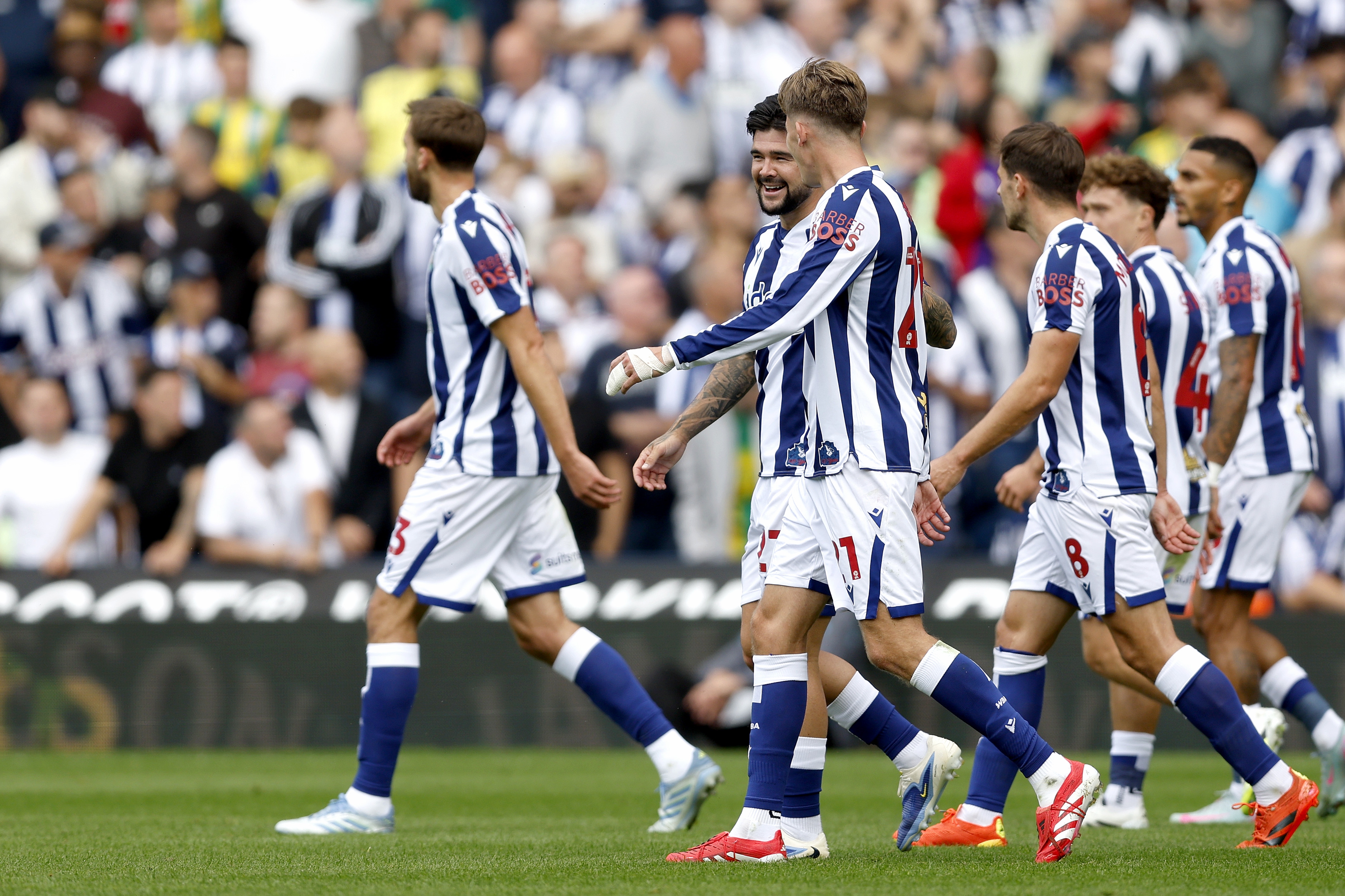 Isaac Price celebrates with team-mates after scoring against Blackburn 