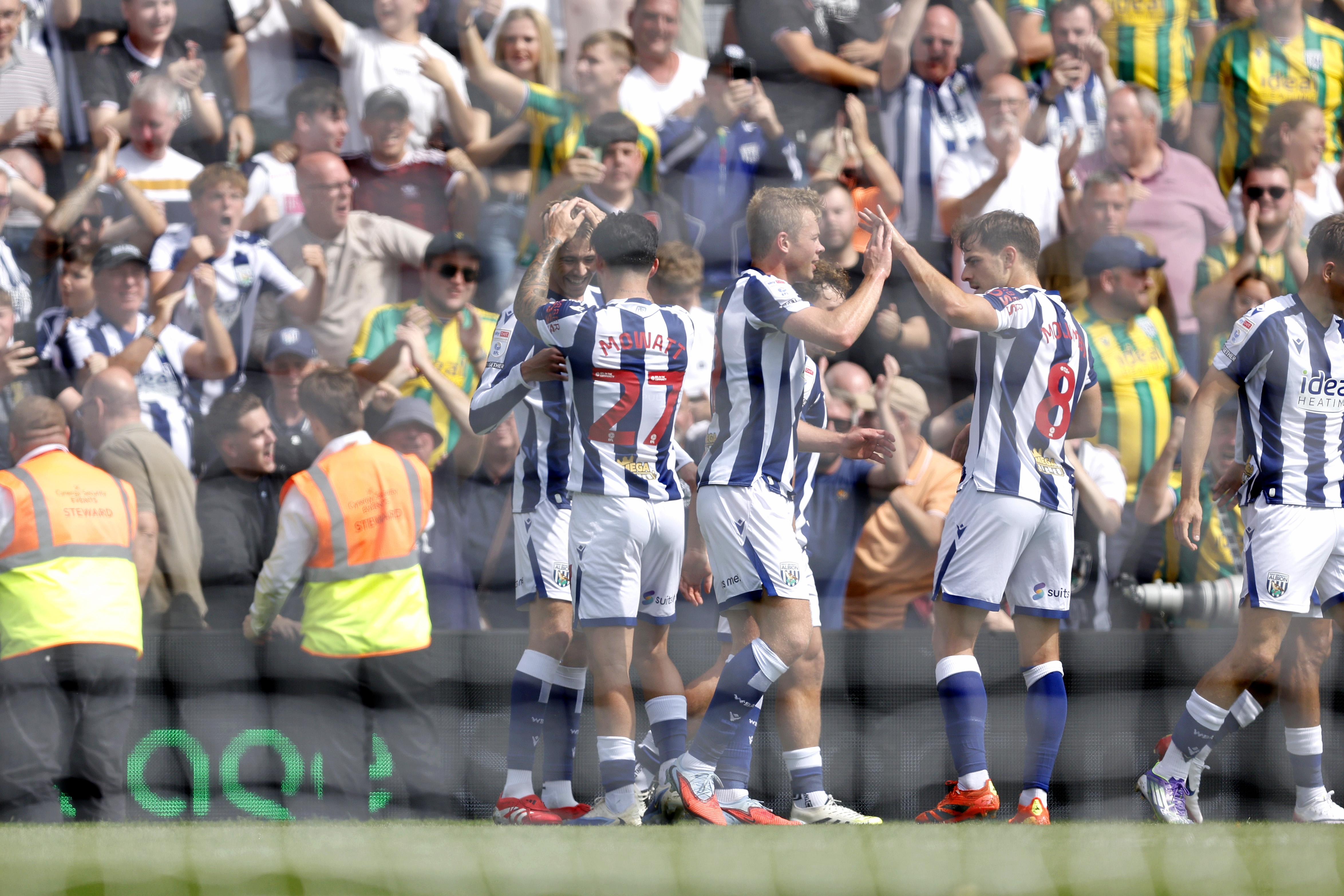 Isaac Price celebrates scoring his first goal at Wrexham with team-mates