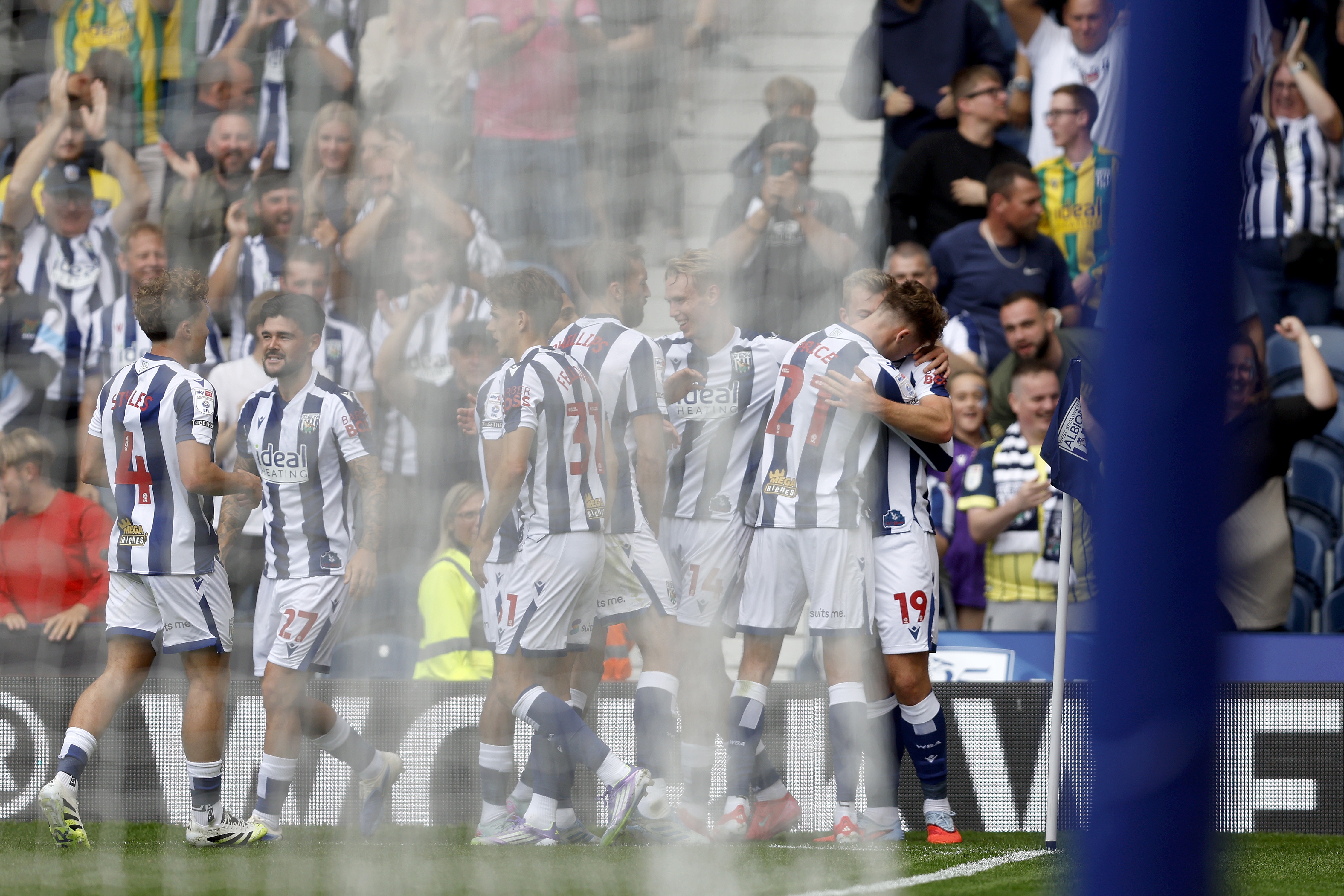 Isaac Price celebrates with team-mates after scoring against Blackburn 