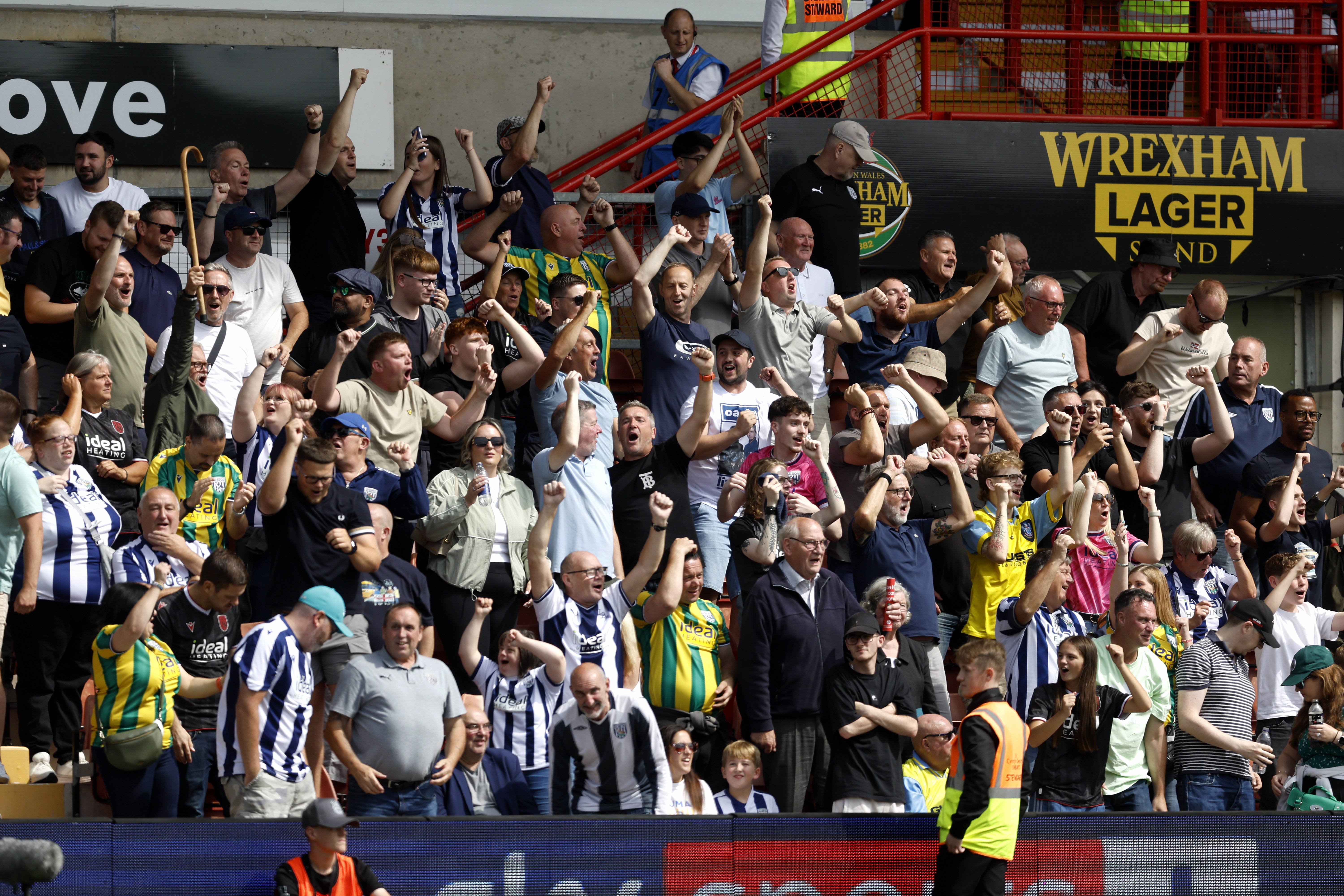 Albion fans celebrating a goal at Wrexham 