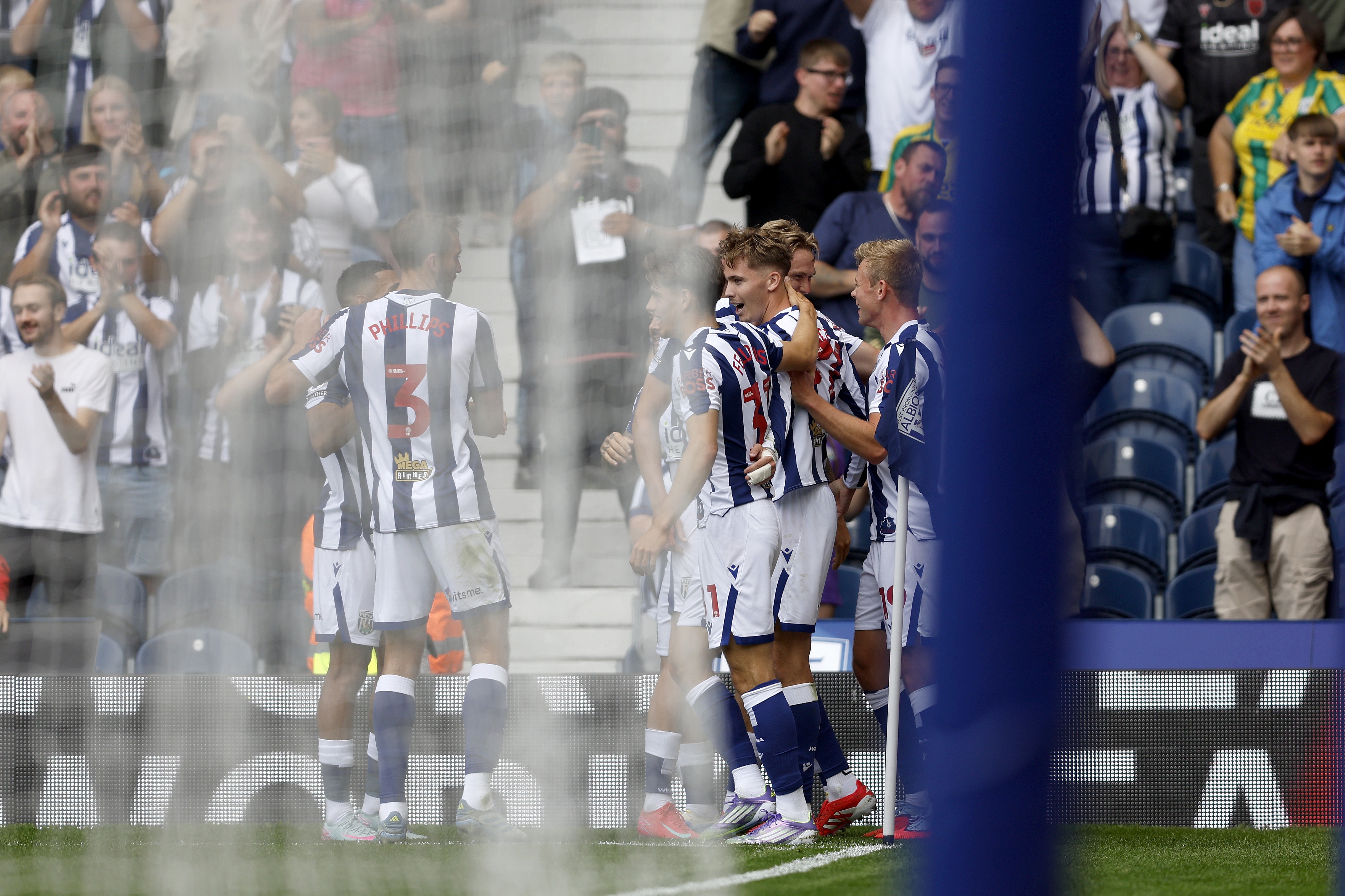 Isaac Price celebrates with team-mates after scoring against Blackburn 