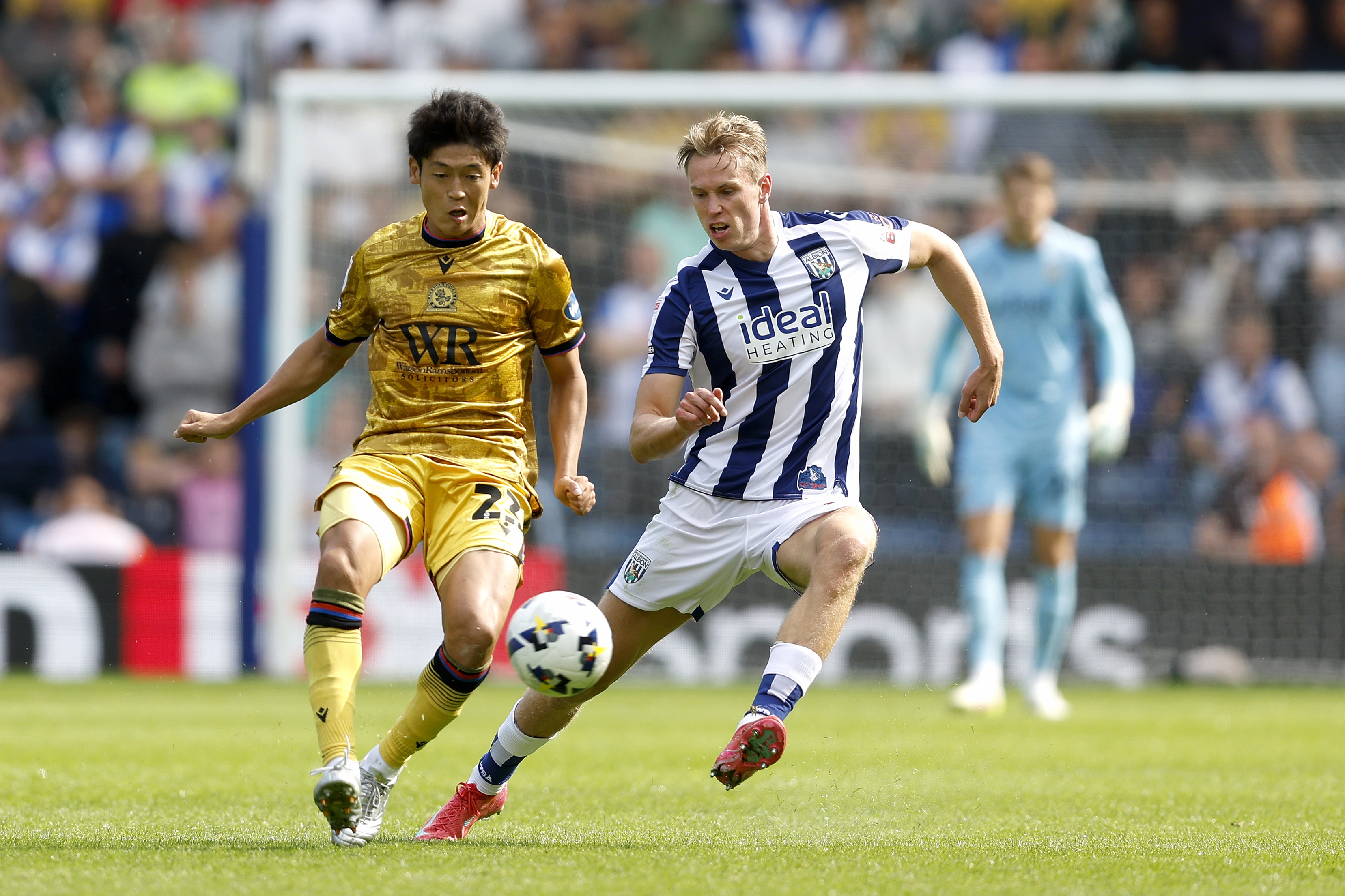 Torbjørn Heggem fighting for the ball against a Blackburn player