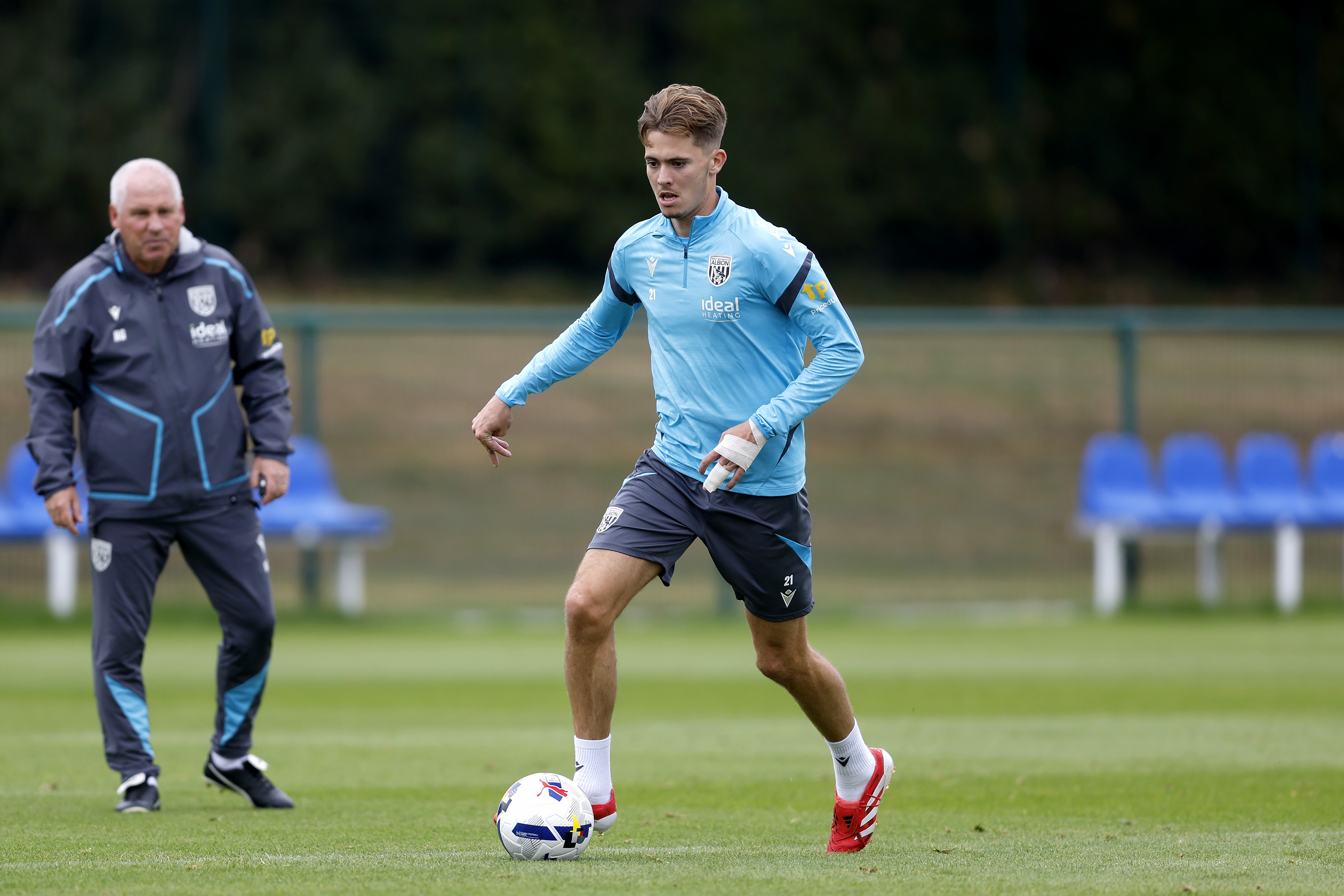 Isaac Price on the ball during training 