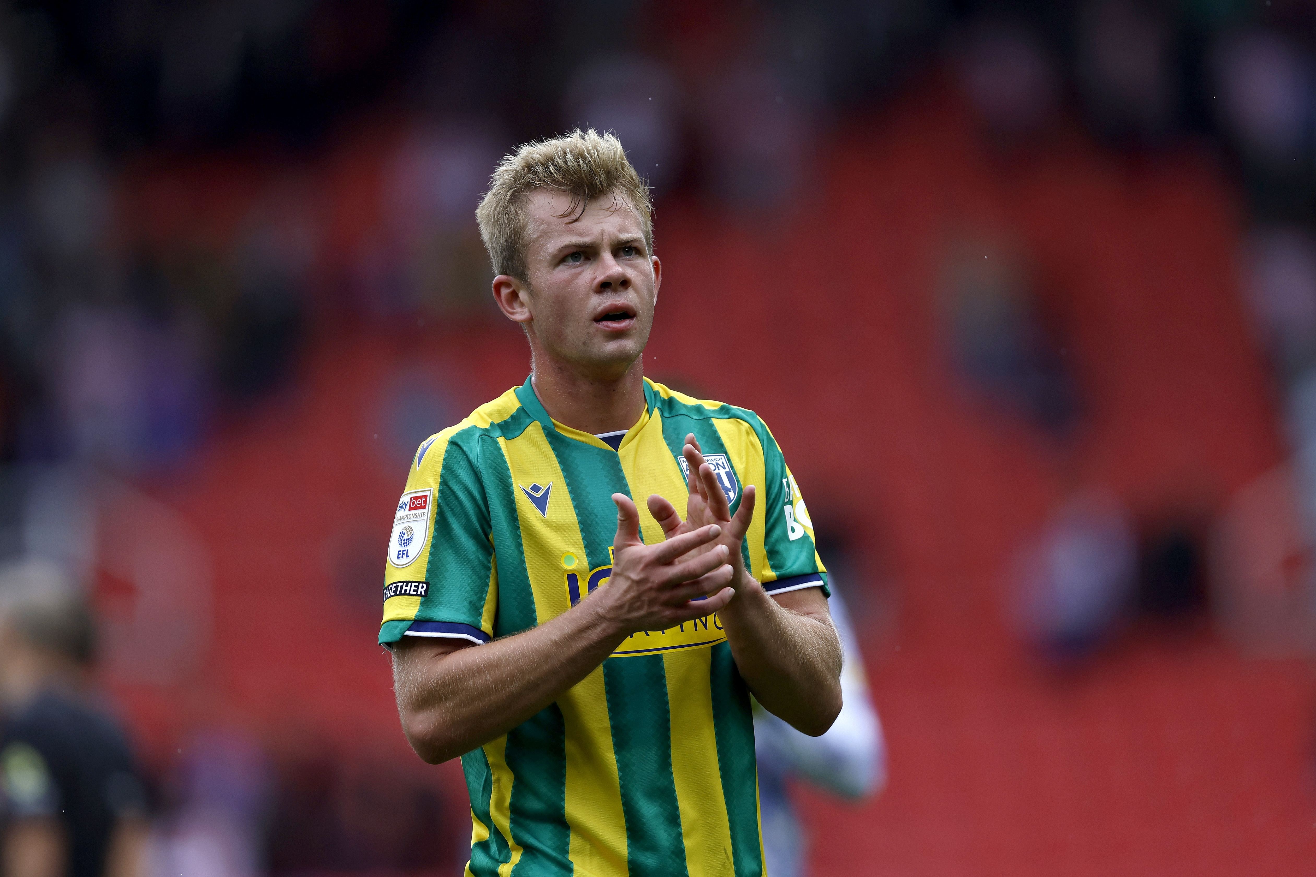 Aune Heggebø applauding WBA fans at Stoke 