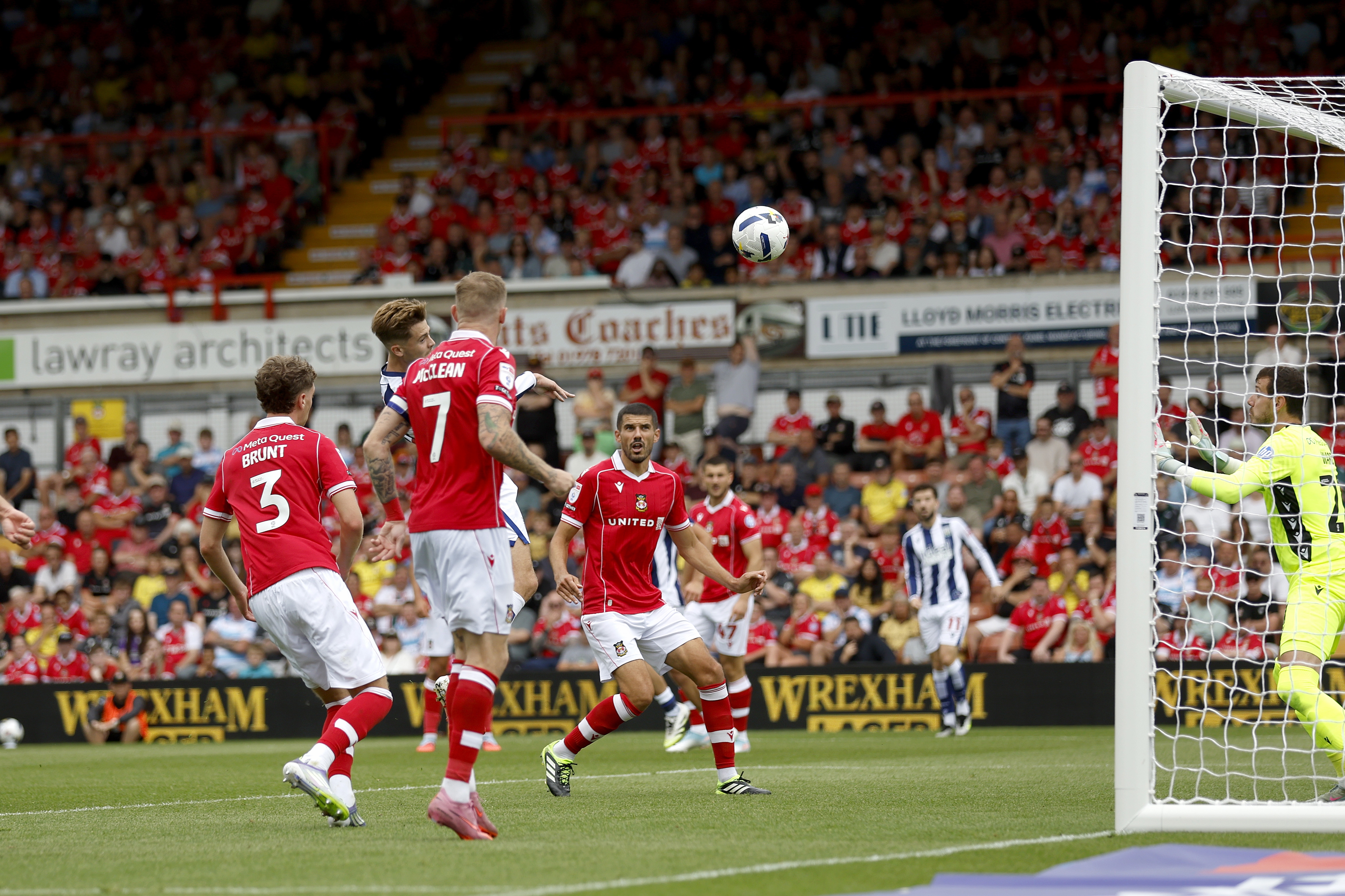 Isaac Price scoring a header against Wrexham 