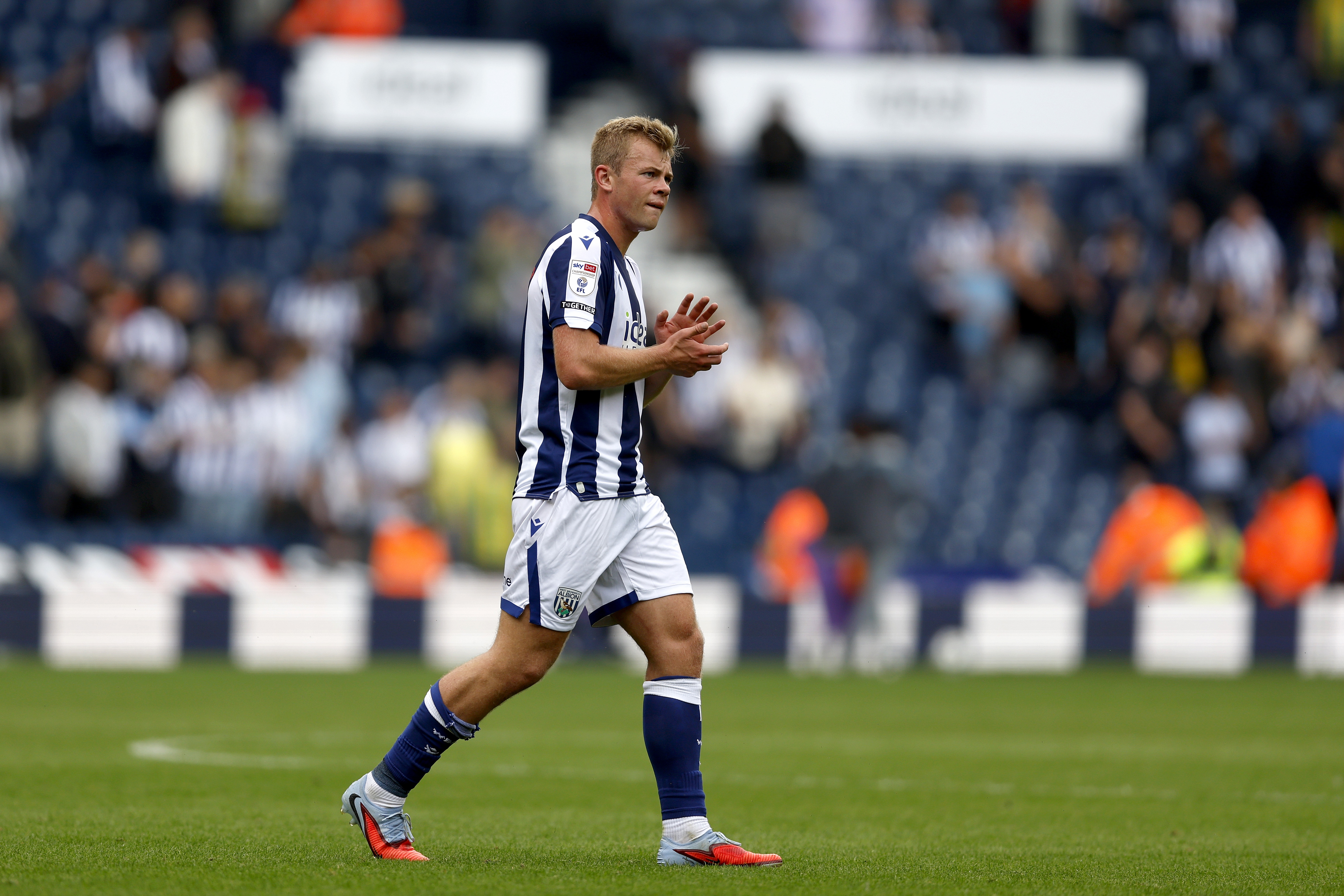 Aune Heggebø applauding WBA fans after the win over Blackburn