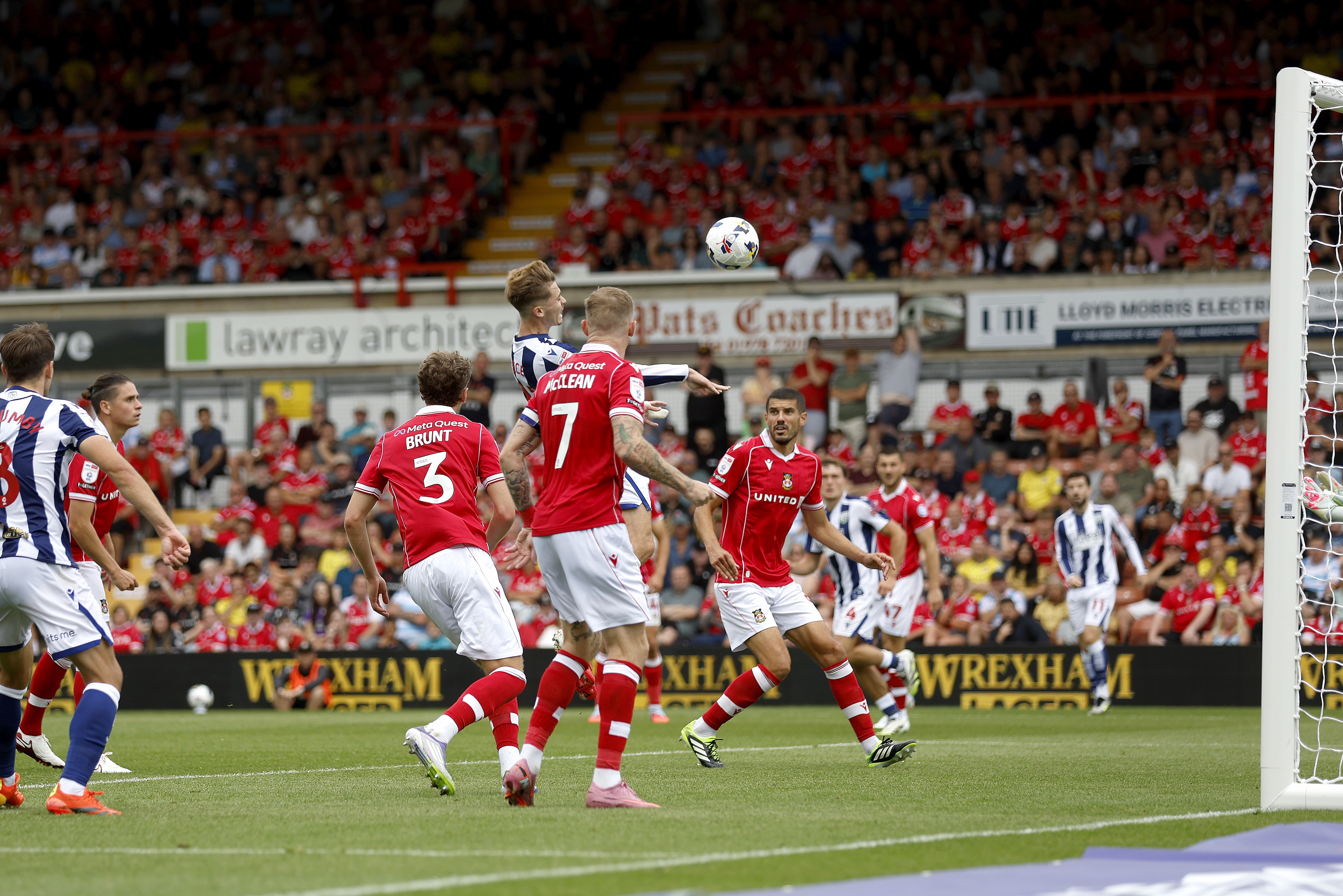 Isaac Price scoring a header against Wrexham 