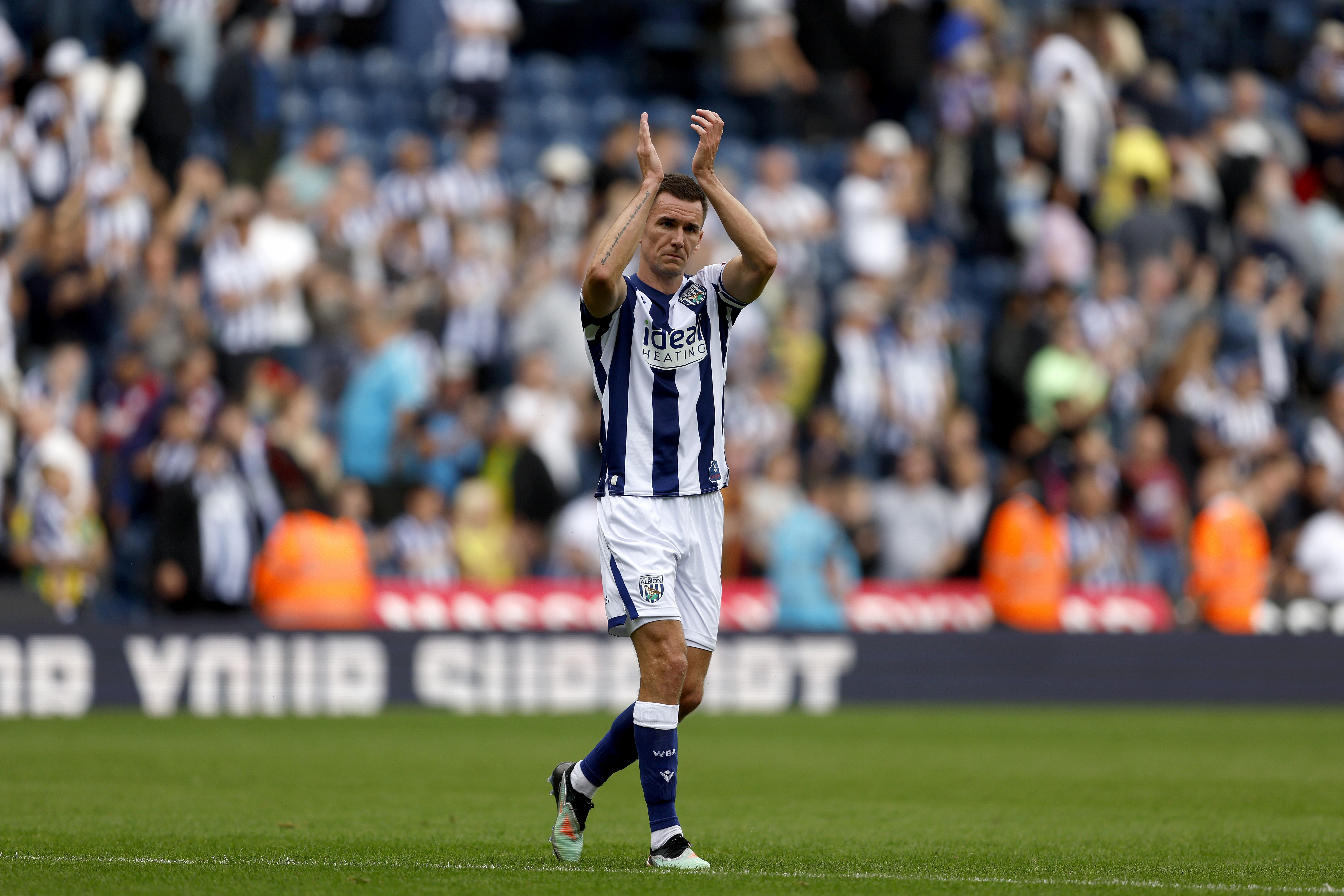 Jed Wallace applauding WBA fans after the win over Blackburn