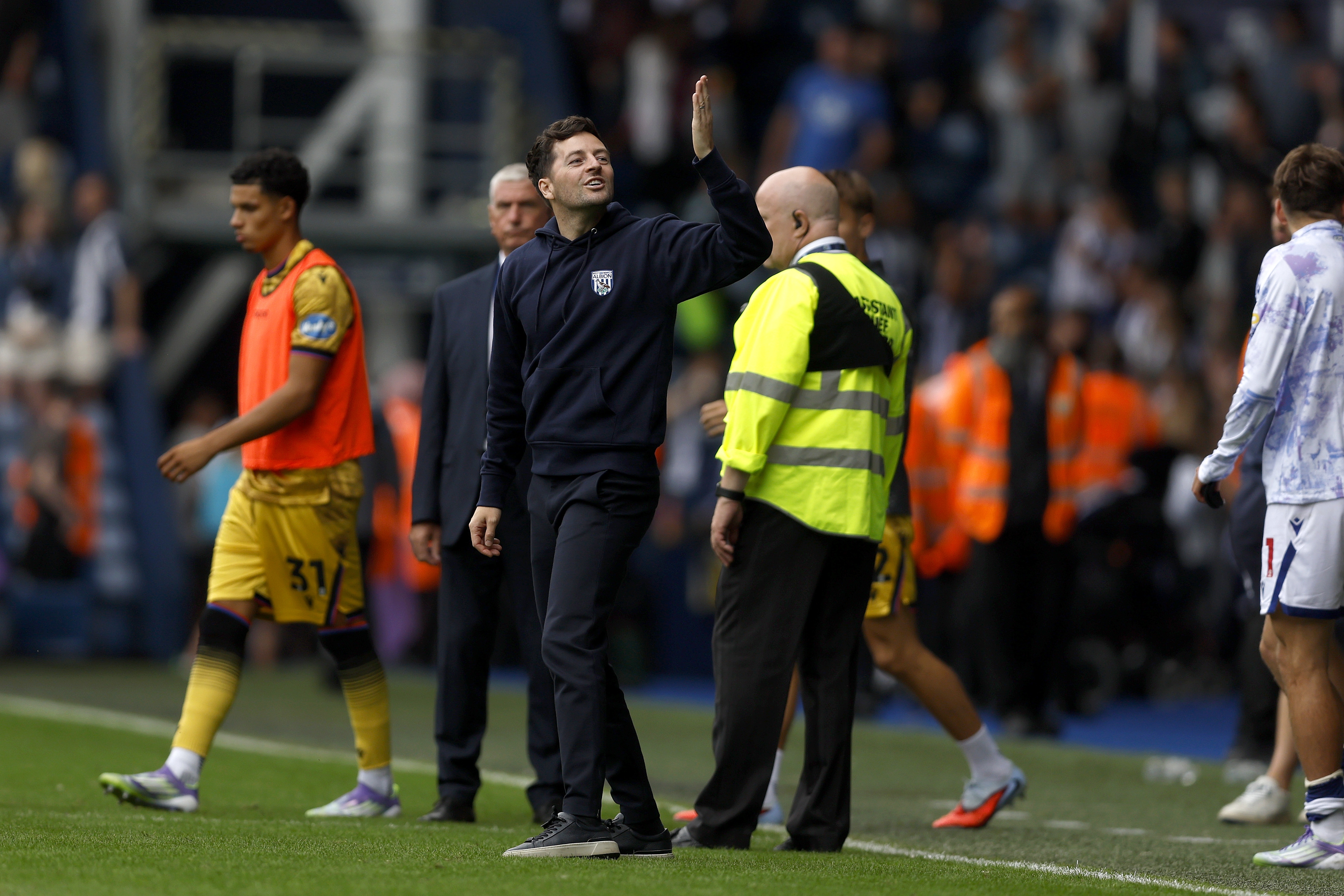 Ryan Mason blowing a kiss to his family while stood on the side of the pitch at The Hawthorns