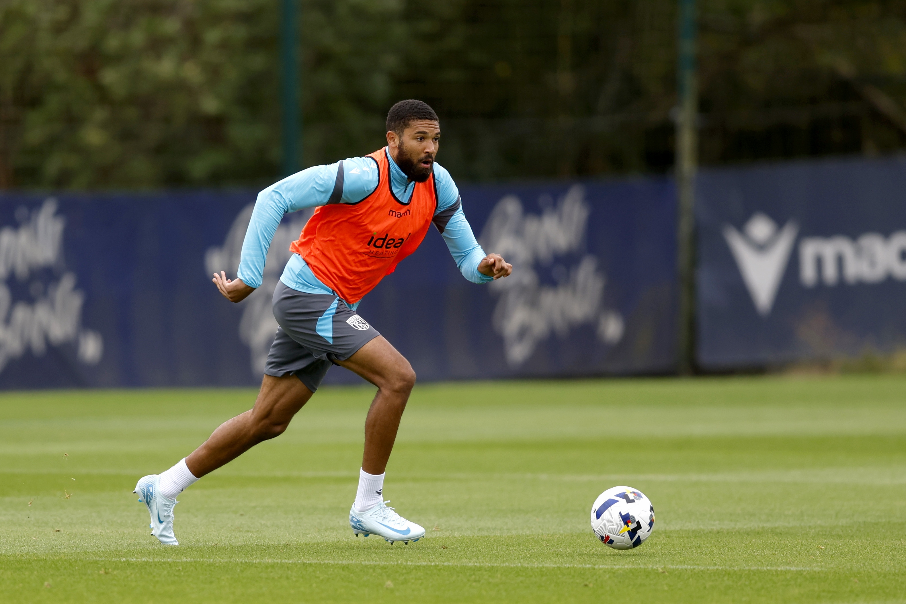 George Campbell on the ball during training 