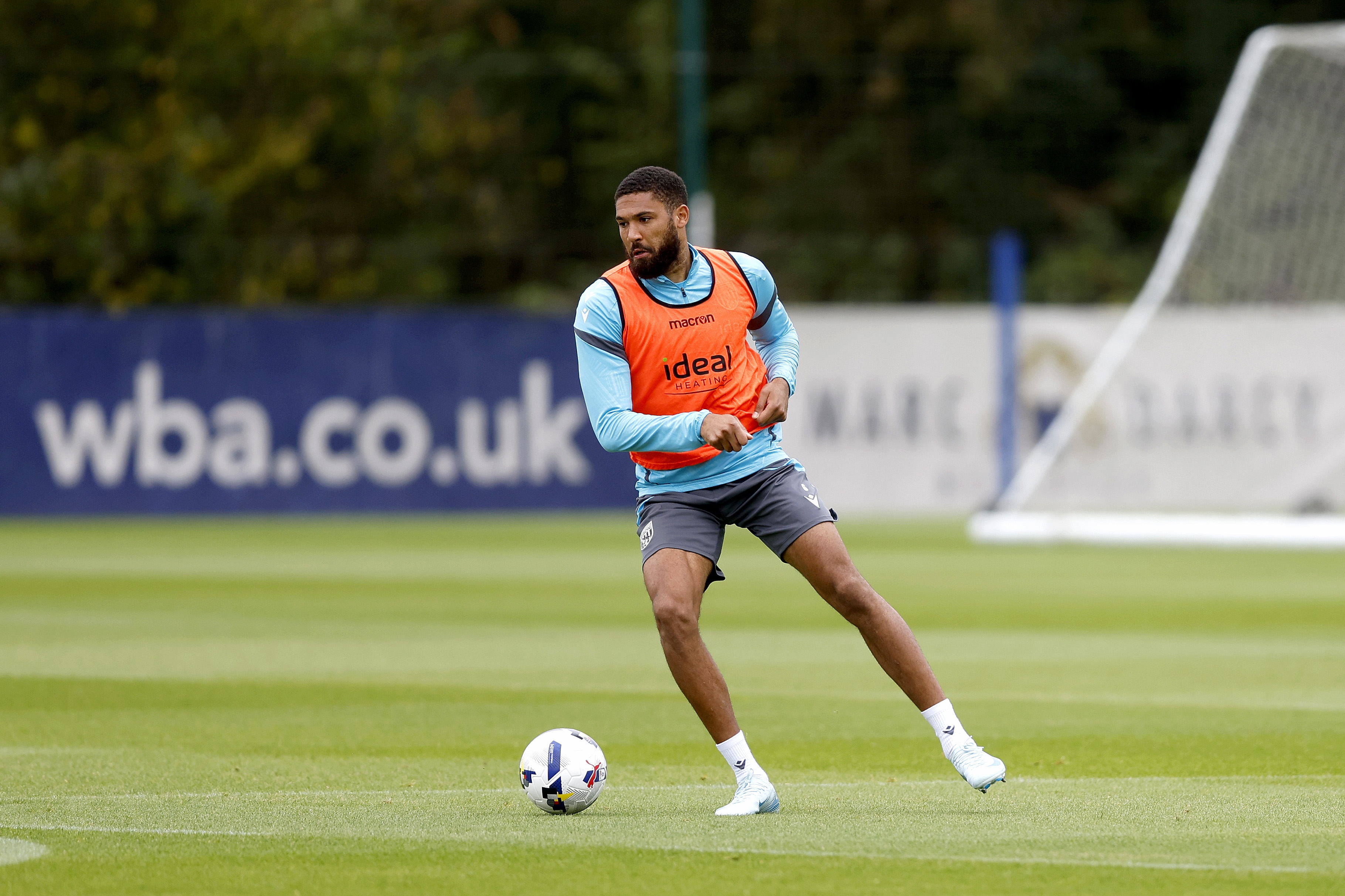 George Campbell on the ball during training 
