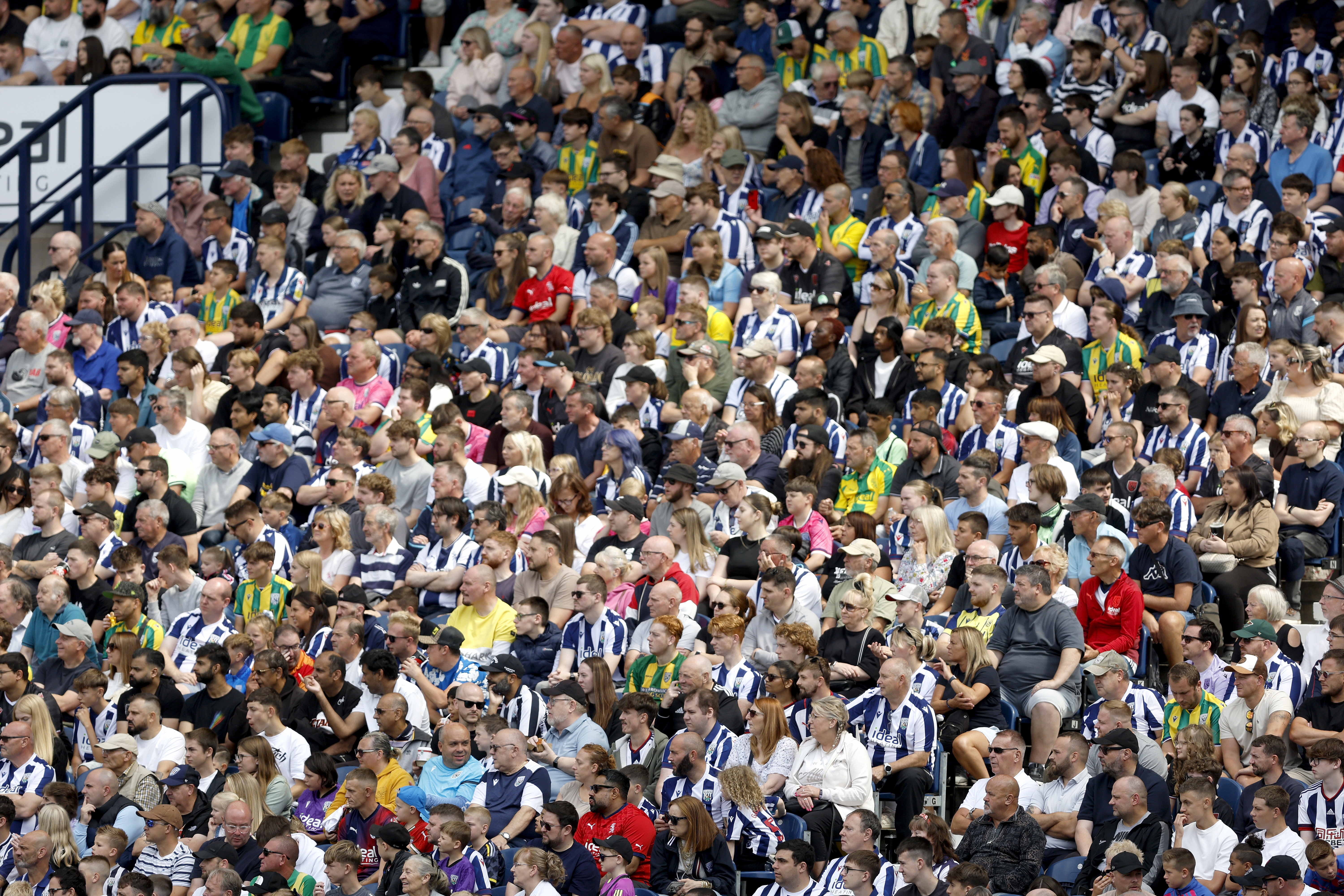 A general view of several hundred WBA fans in the stand during the game against Rayo Vallecano 
