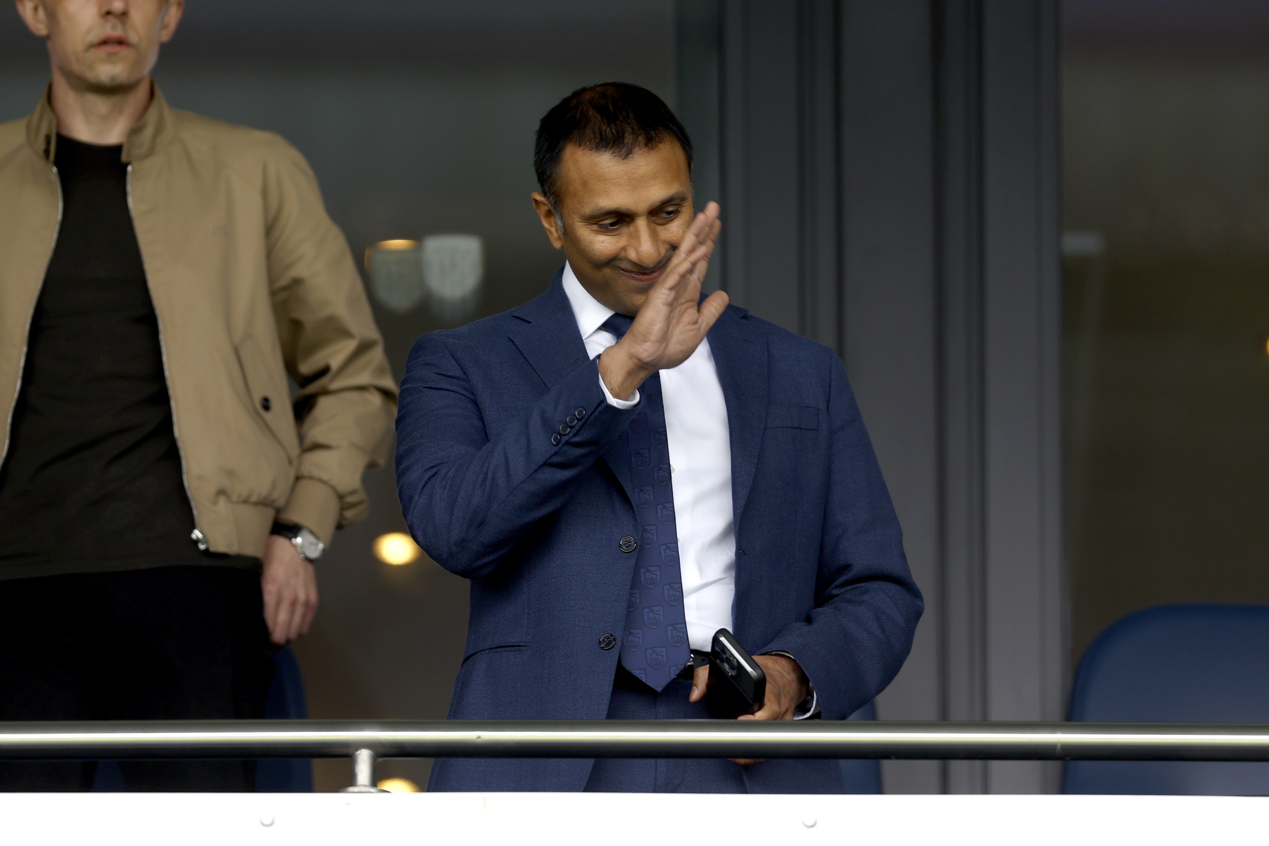 Shilen Patel waving to WBA fans