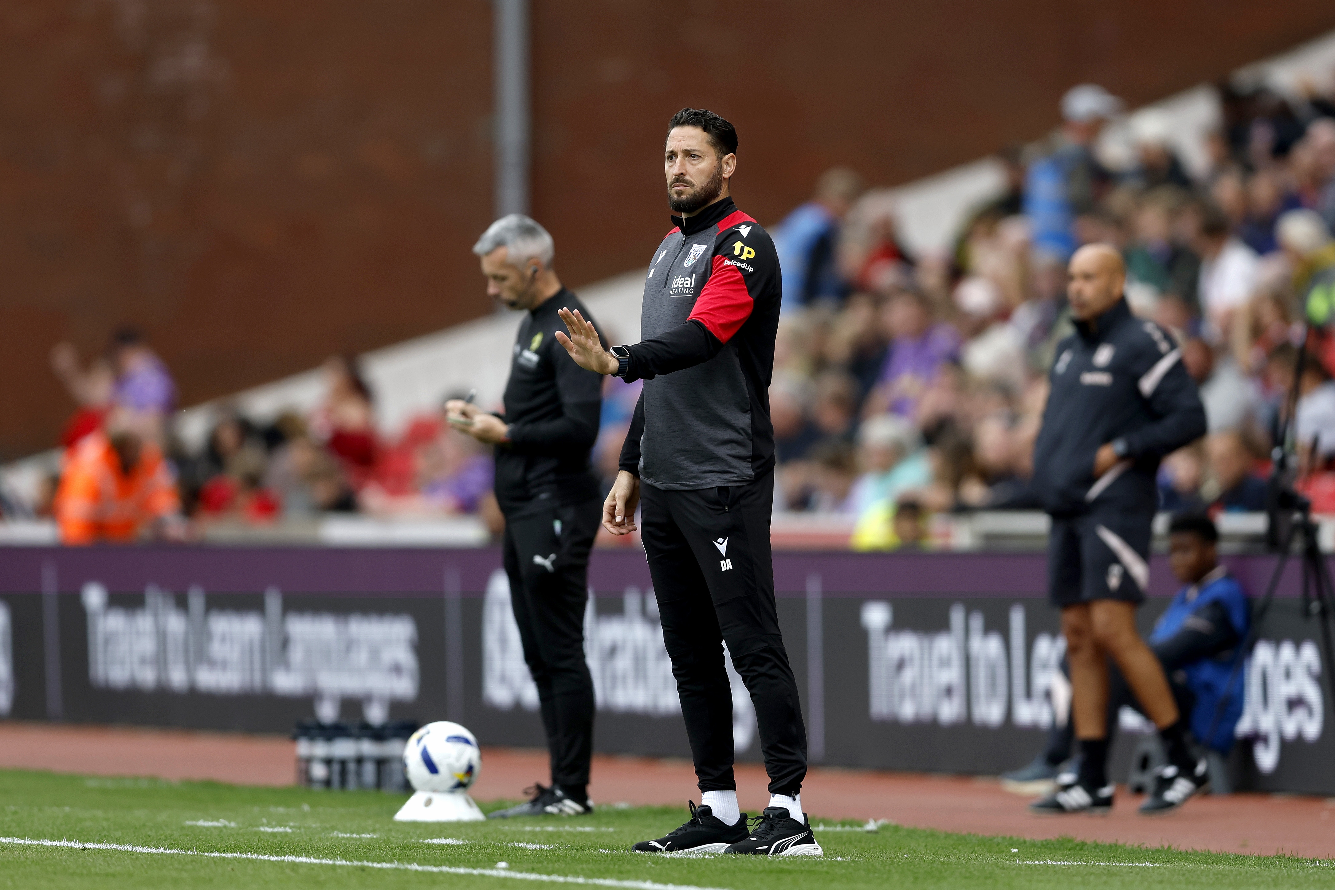Damia Abella on the sideline at Stoke 