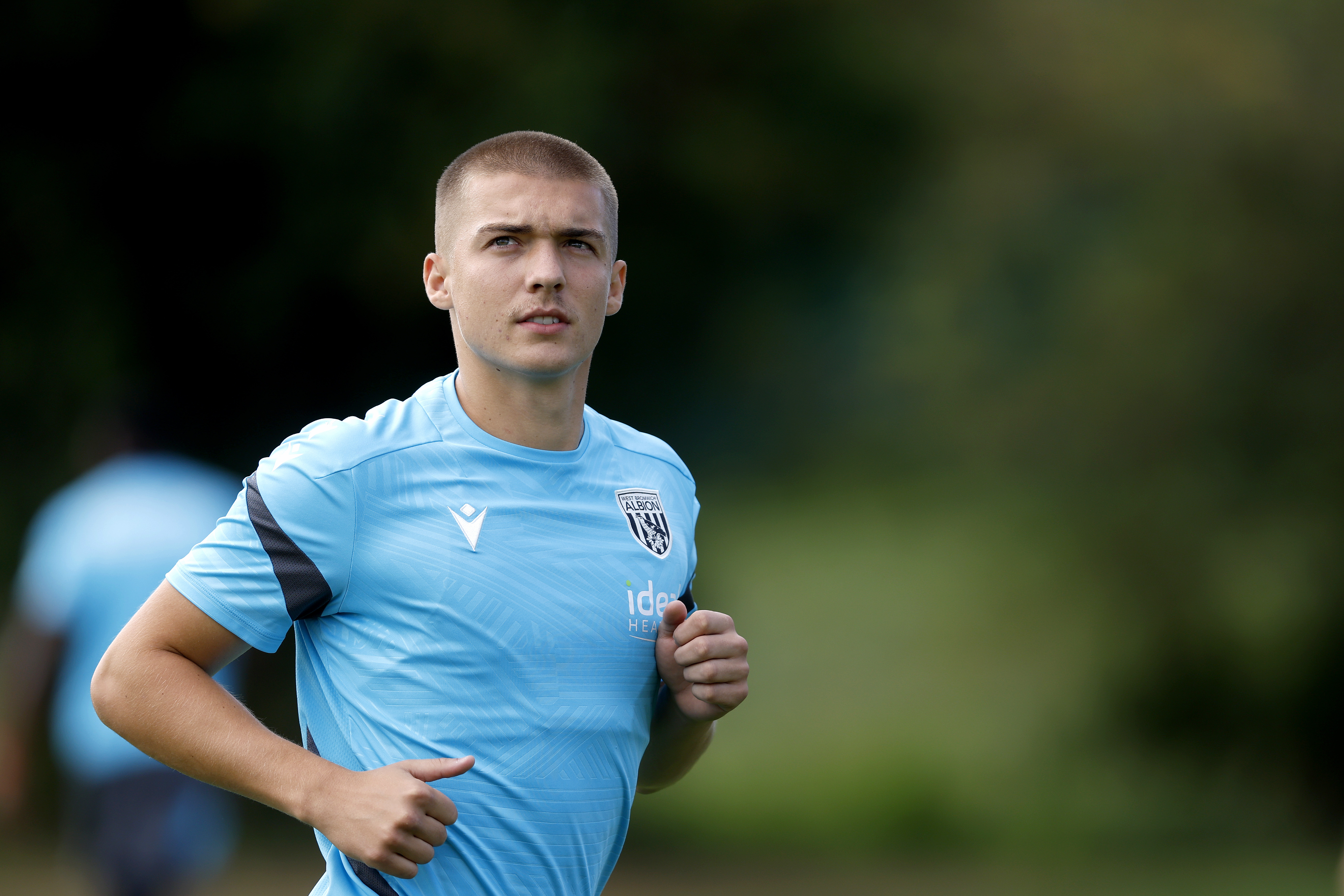 Alfie Gilchrist running in training