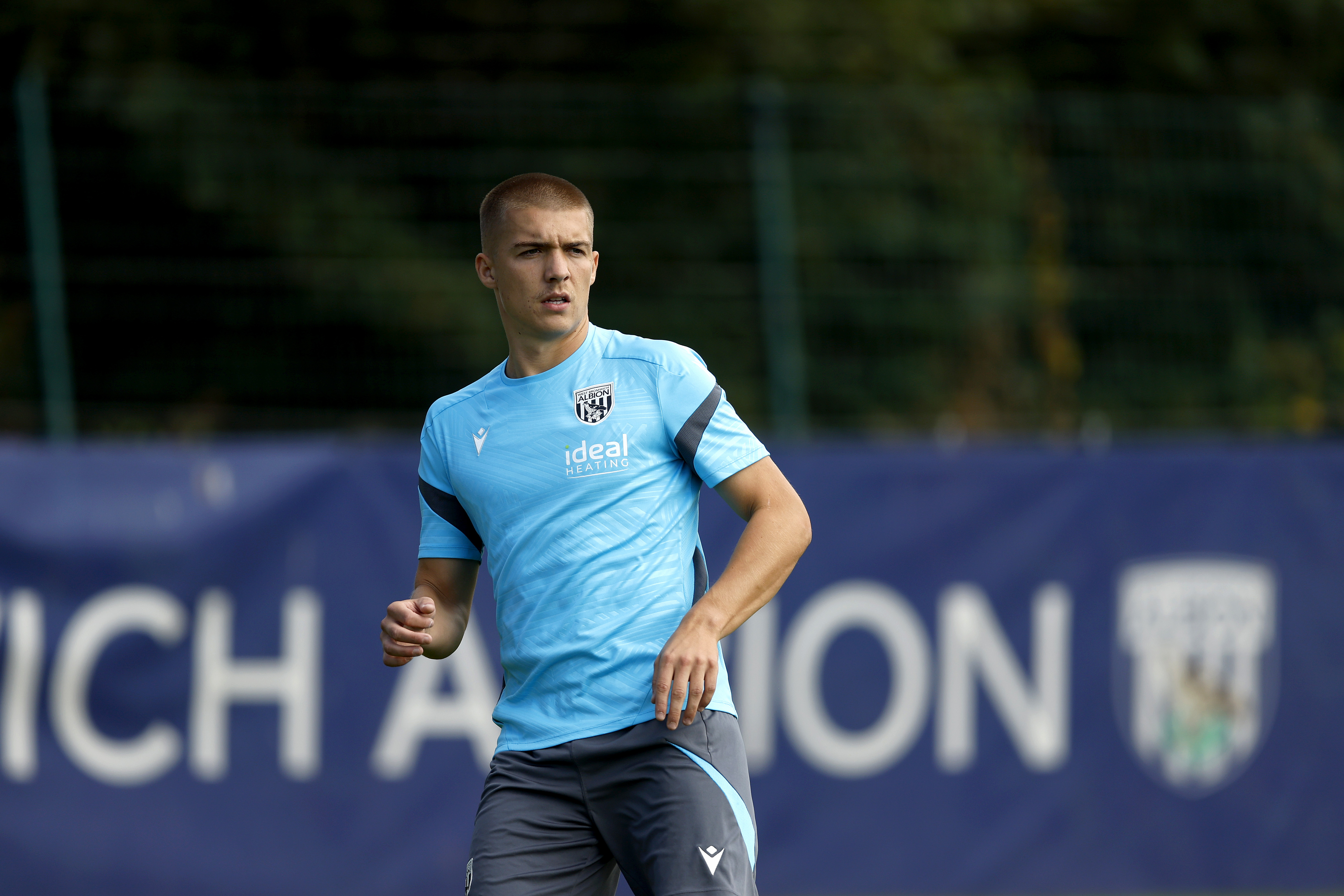 Alfie Gilchrist running in training 