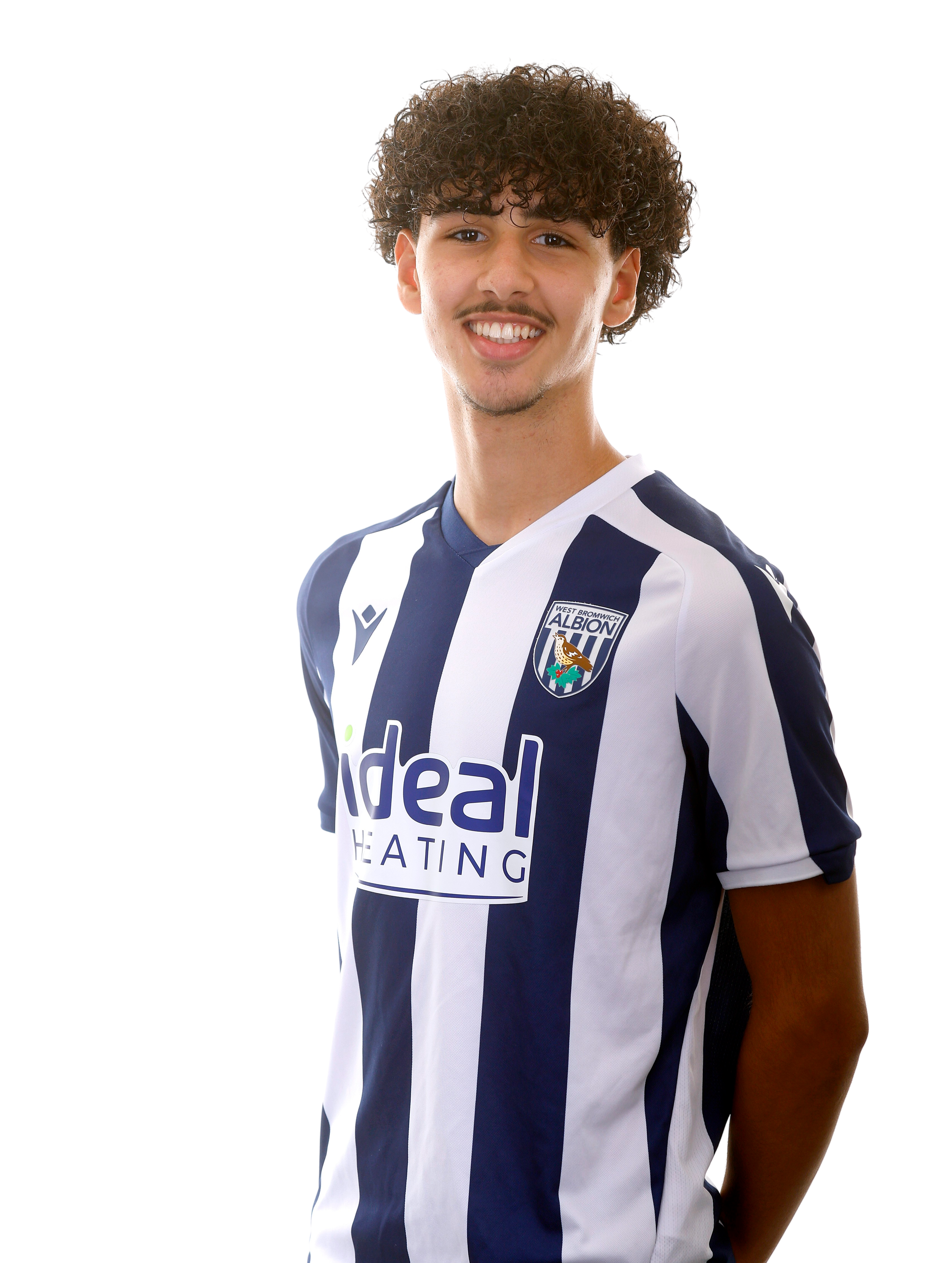 A photo of Albion U18 defender Adam Letlat in the 2025/26 home kit
