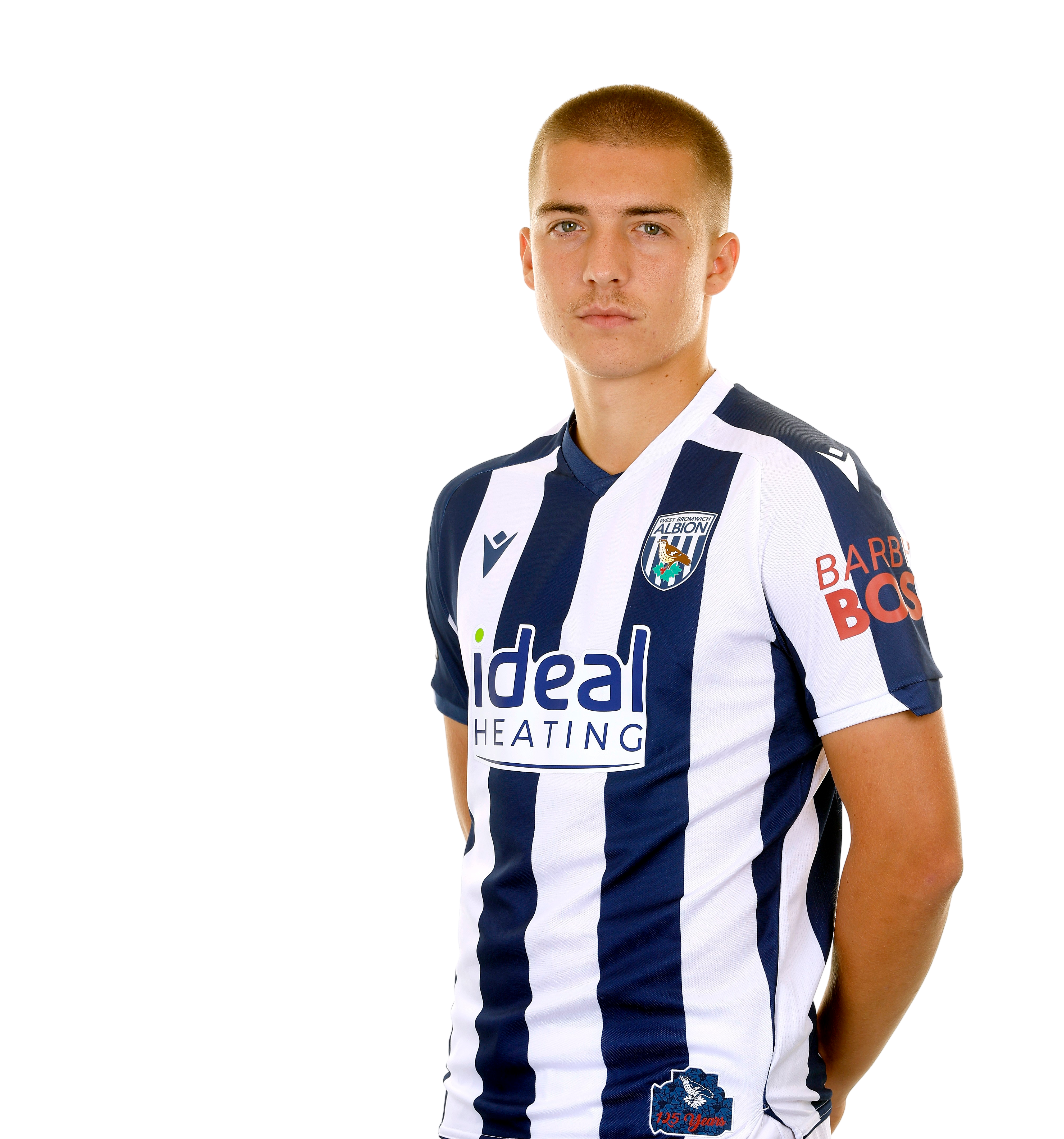 A photo of Albion defender Alfie Gilchrist in the 2025/26 home kit