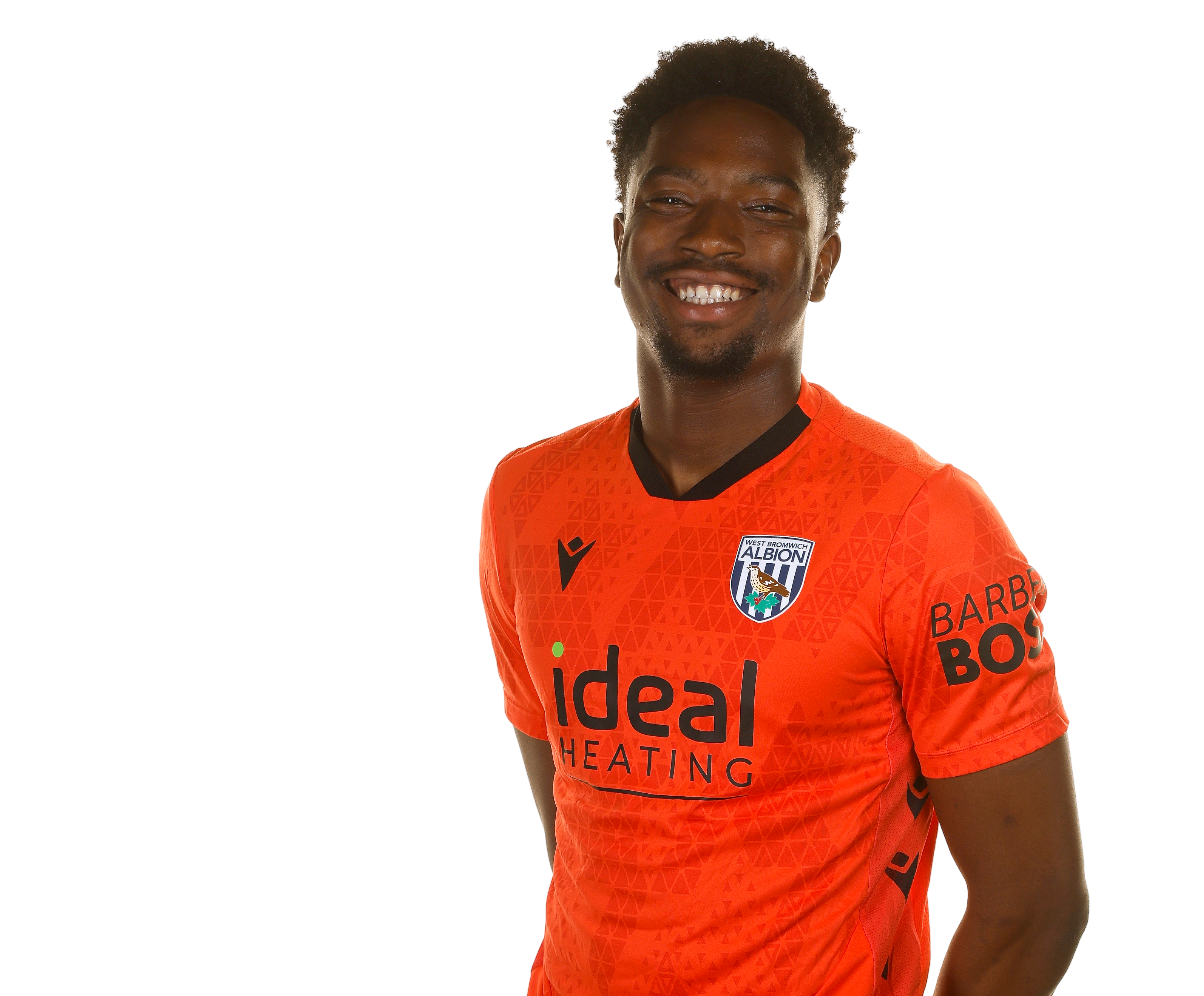 A photo of Albion U21 goalkeeper Ben Cisse in the 2025/26 orange keeper kit