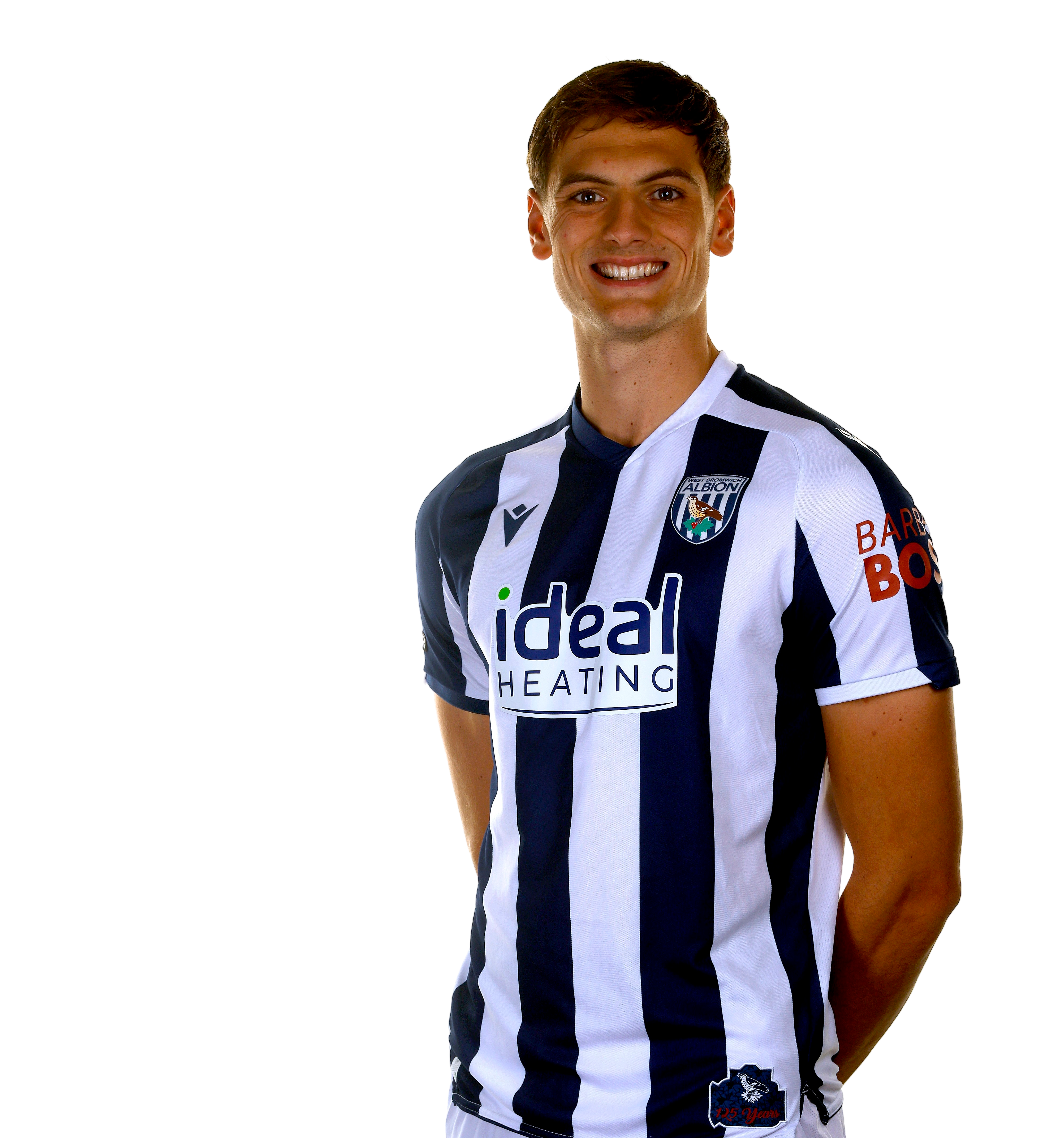 A photo of Albion defender Caleb Taylor in the 2025/26 home kit