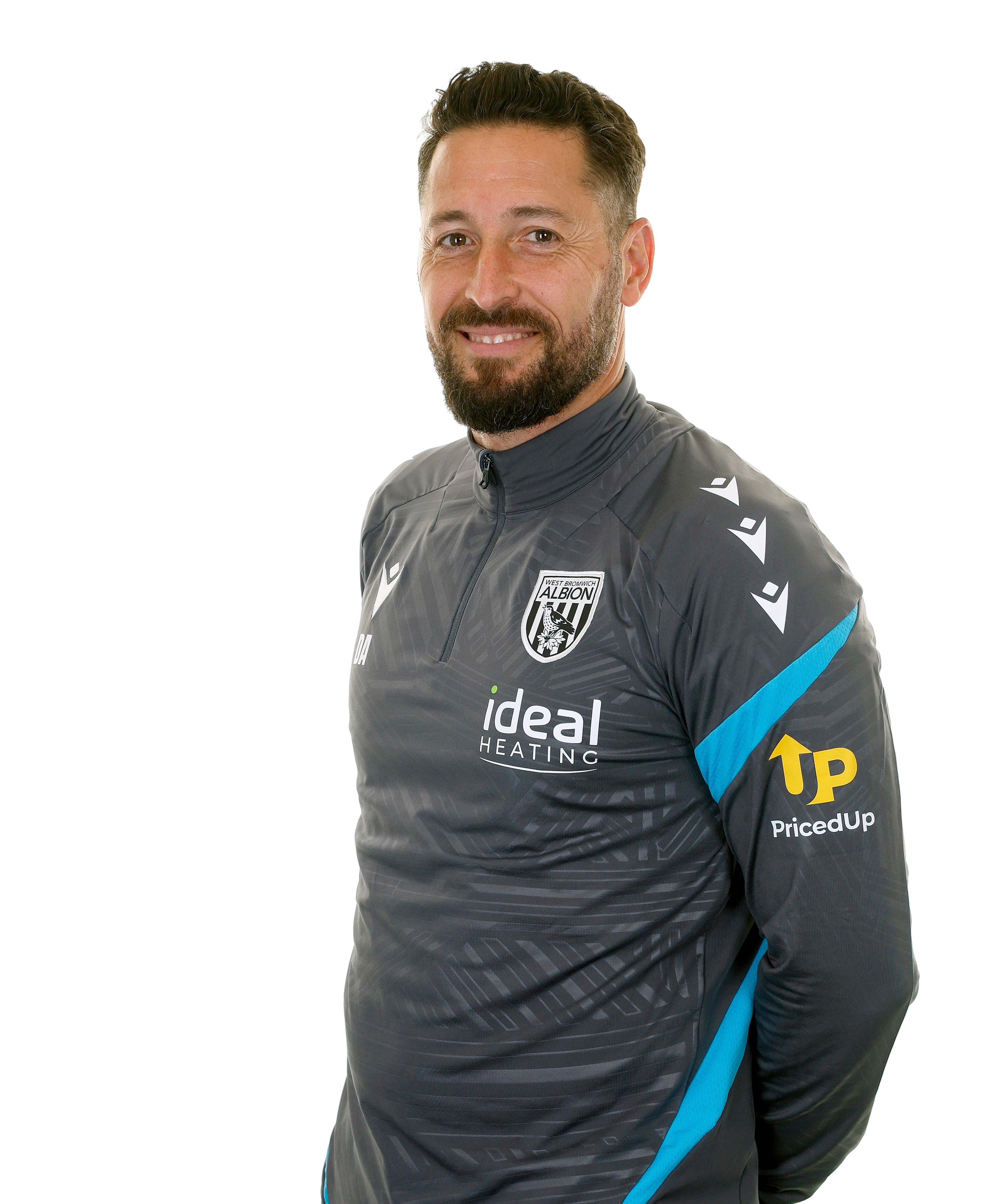 A photo of Albion first team statistical coach Damia Abella in the 2025/26 grey training kit