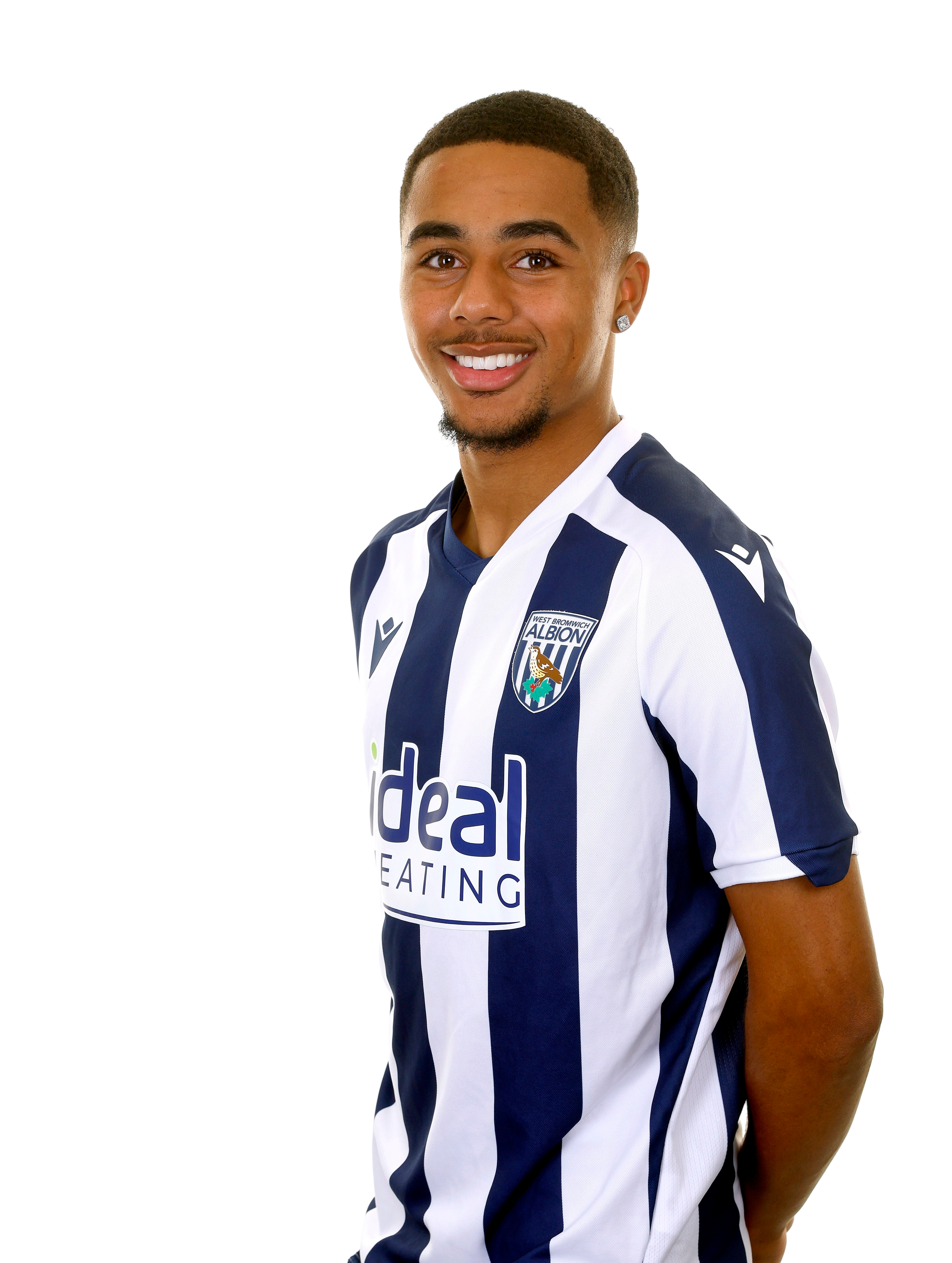 A photo of Albion U21 defender Deago Nelson in the 2025/26 home kit