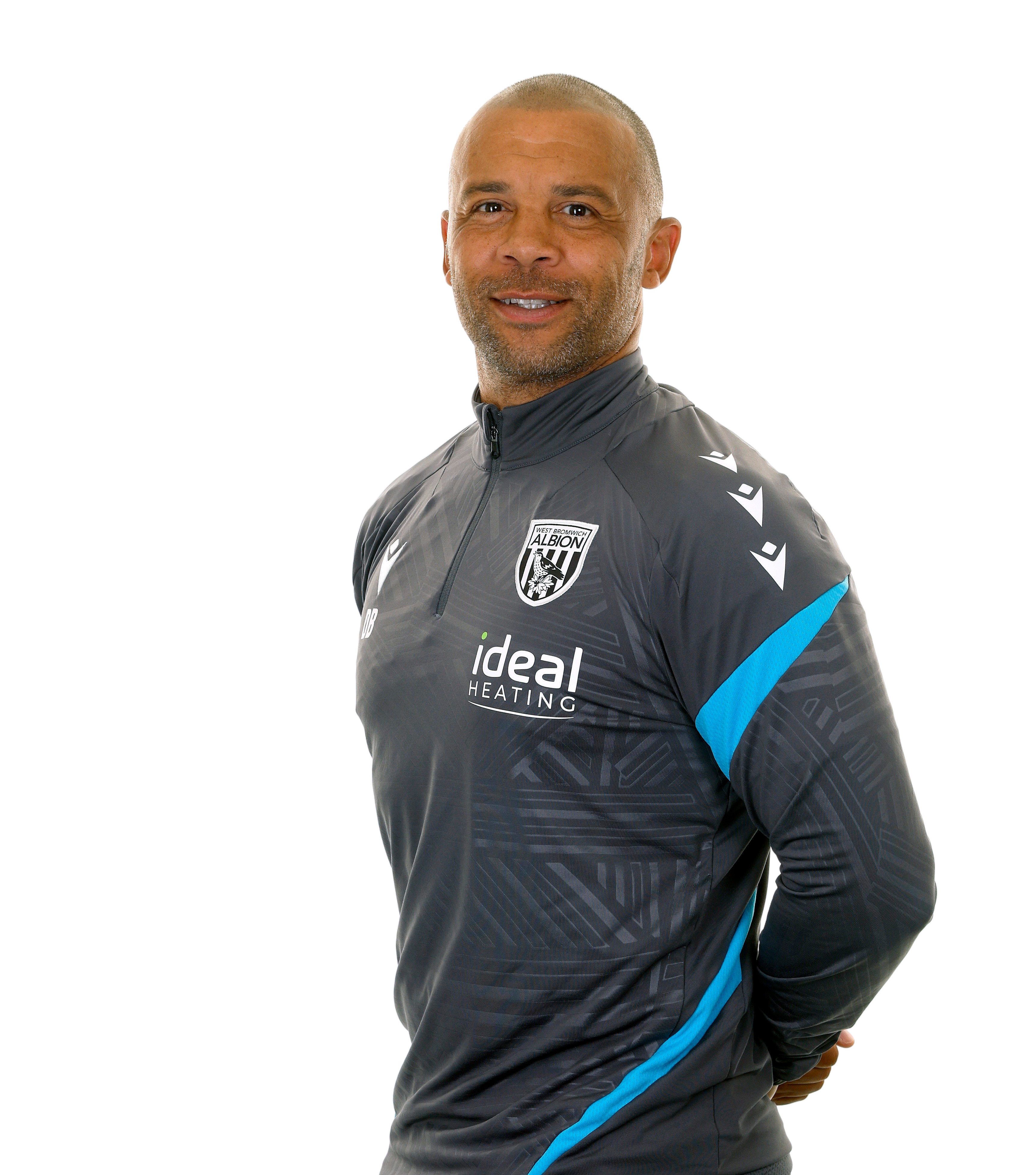 A photo of Albion Senior PDP Coach Deon Burton in the 2025/26 grey training kit