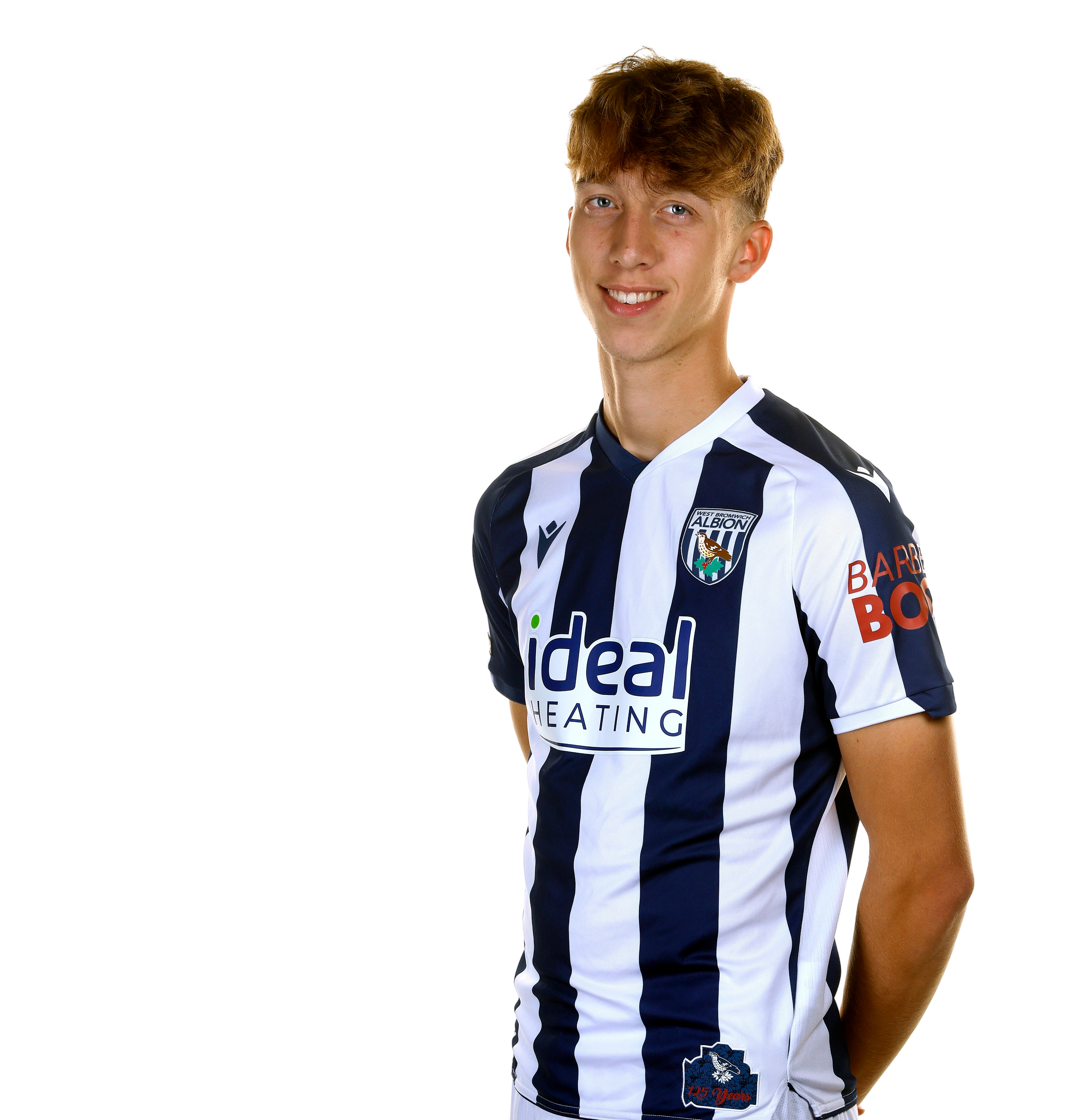 A photo of Albion midfielder Harry Whitwell in the 2025/26 home kit