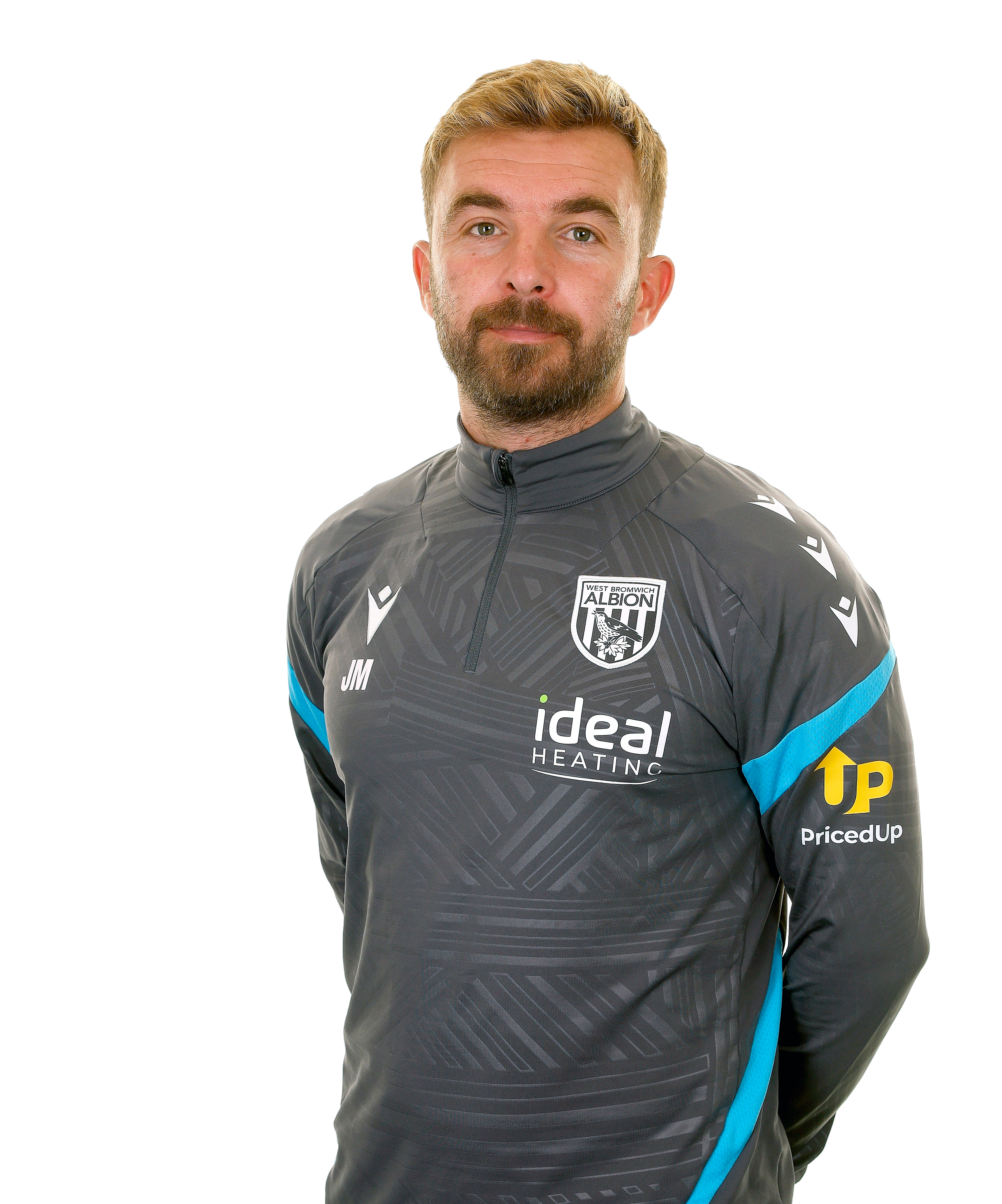 A photo of Albion first team coach James Morrison in the 2025/26 grey training kit