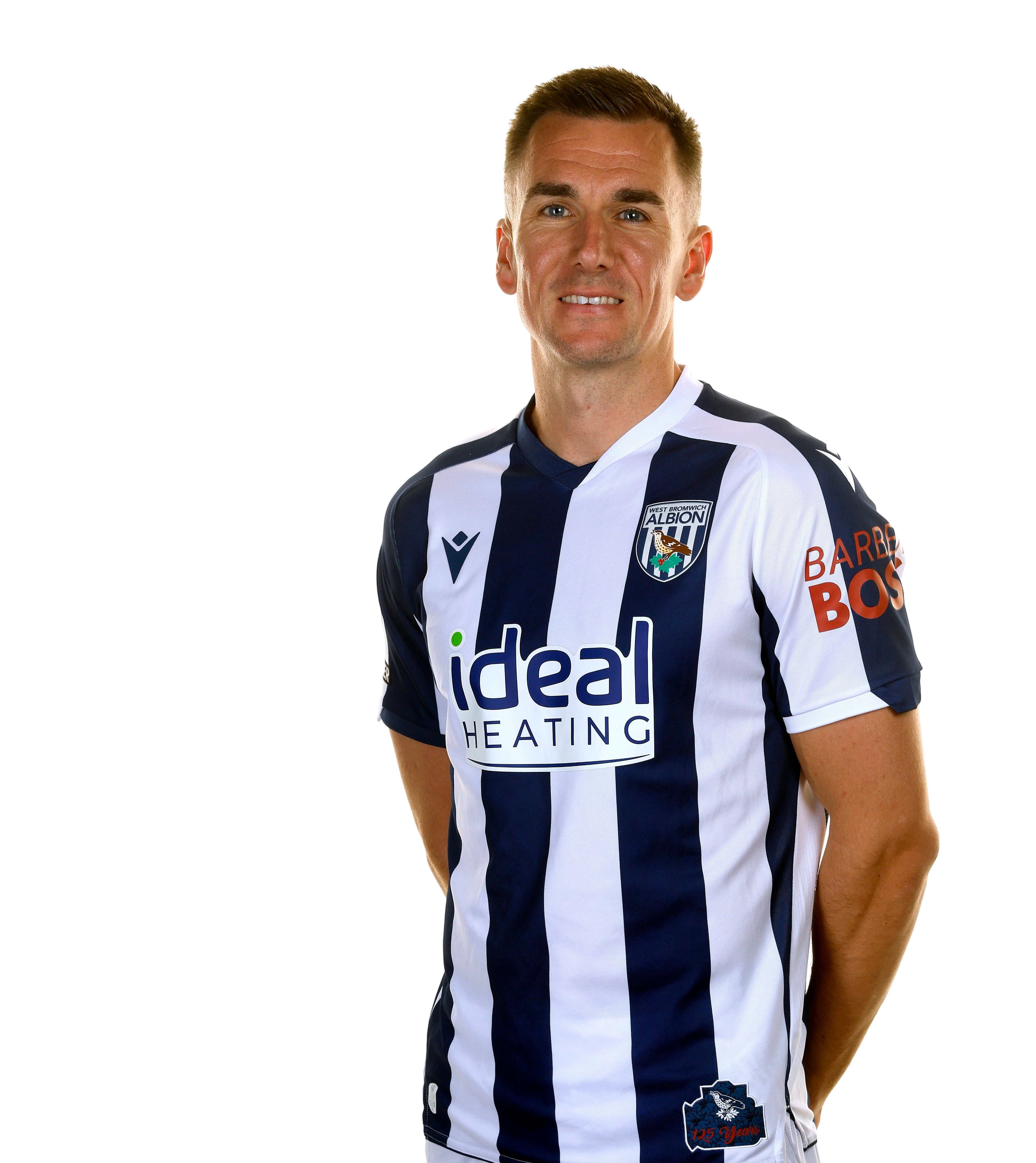 A photo of Albion attacker Jed Wallace in the 2025/26 home kit